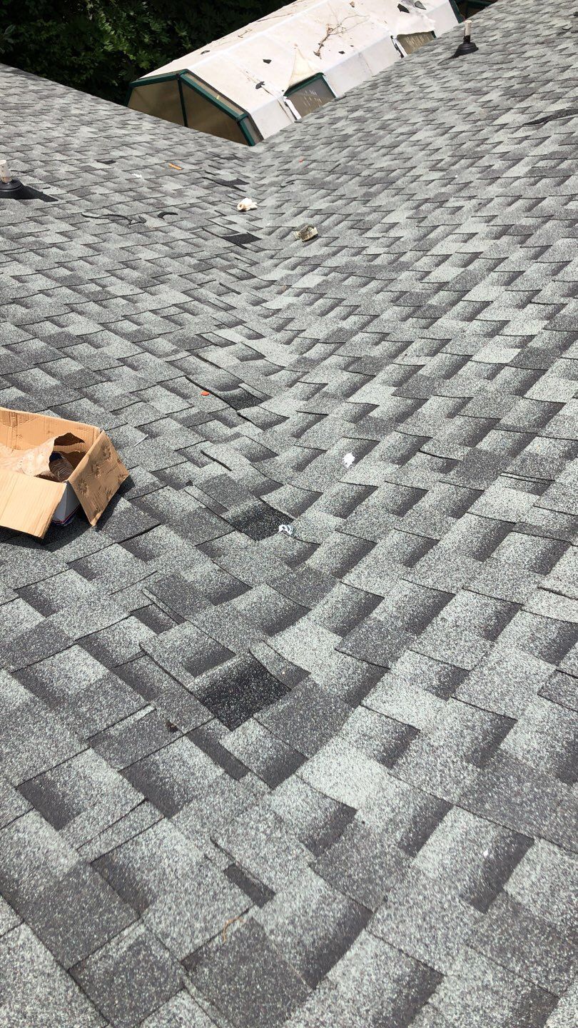 Residential Roofing Installation using Roof Replacement by American Roofing & Construction LLC