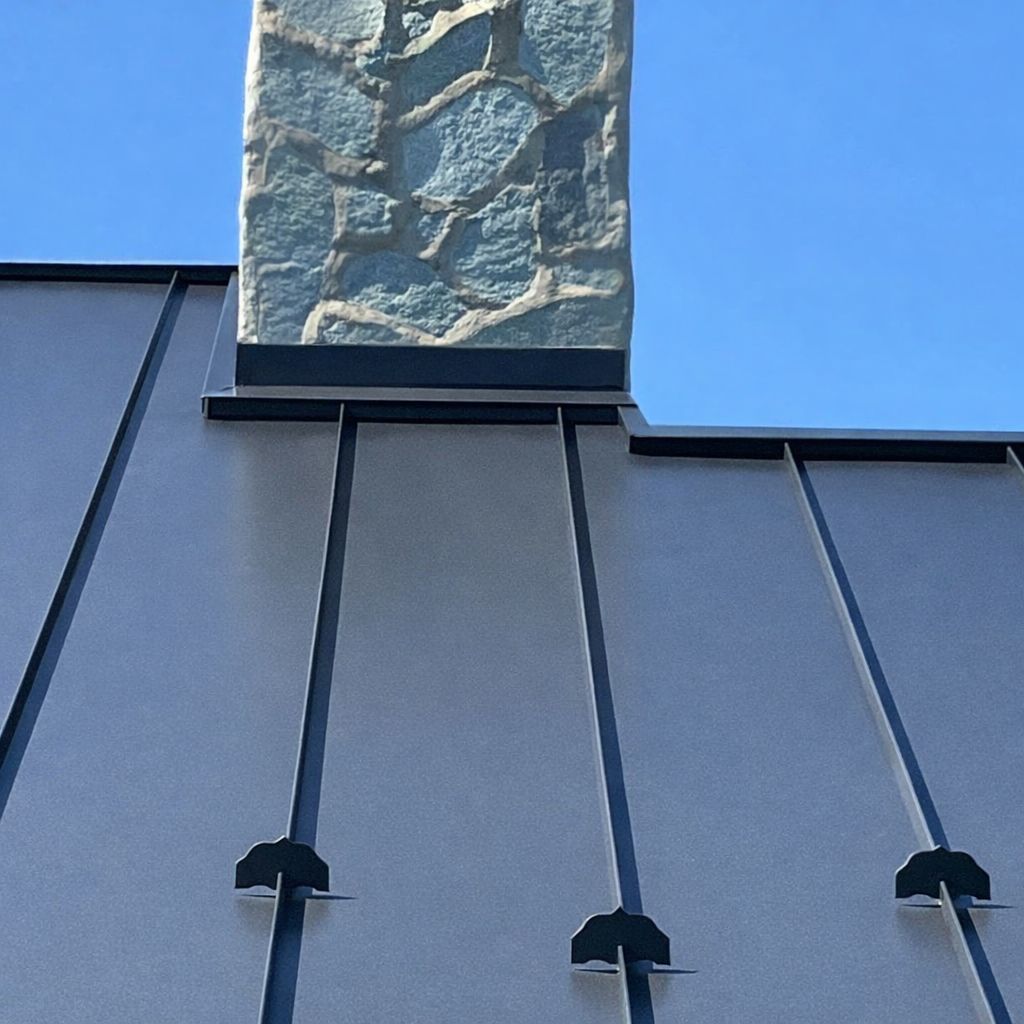 Standing Seam Metal roof-black by Esh Builders
