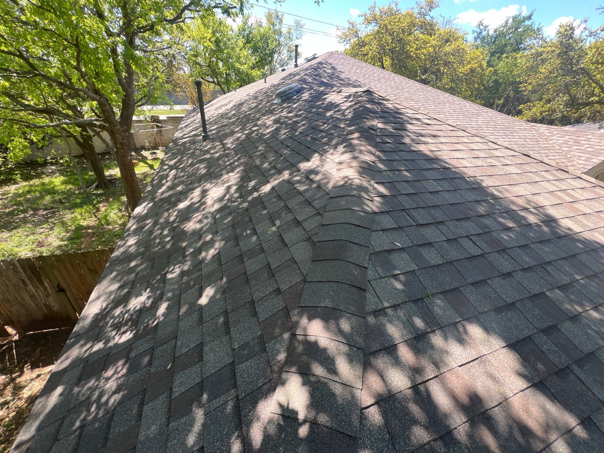 Rental property upgrade using CertainTeed Landmark shingles. by Oakwood Roofing and Construction, LLC