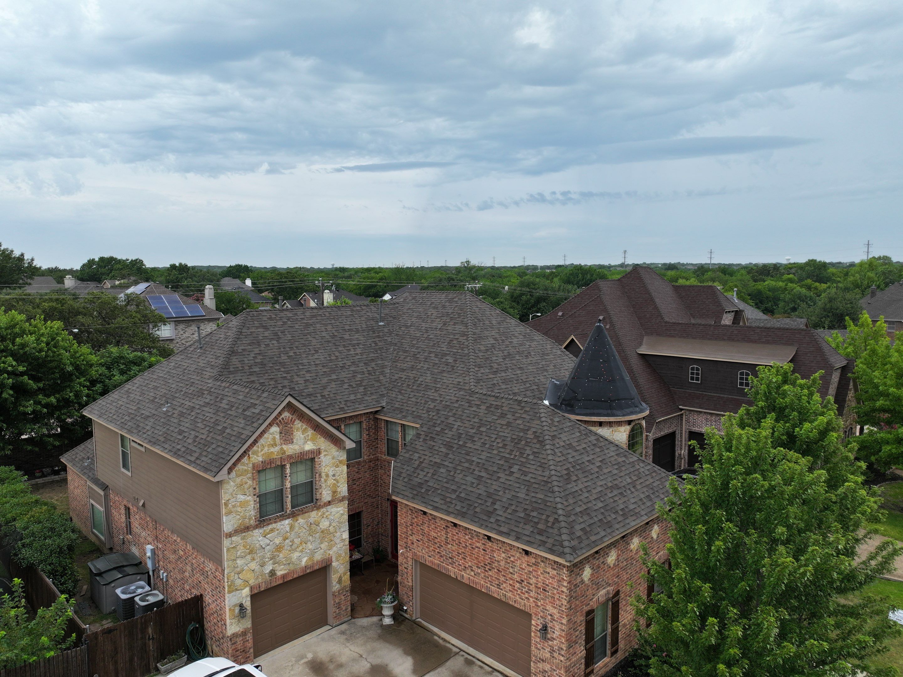 Installing Custom copper turret and Malarkey Vista Class 4 shingles Hail Damage Upgrade by Becker Roofing and Exteriors