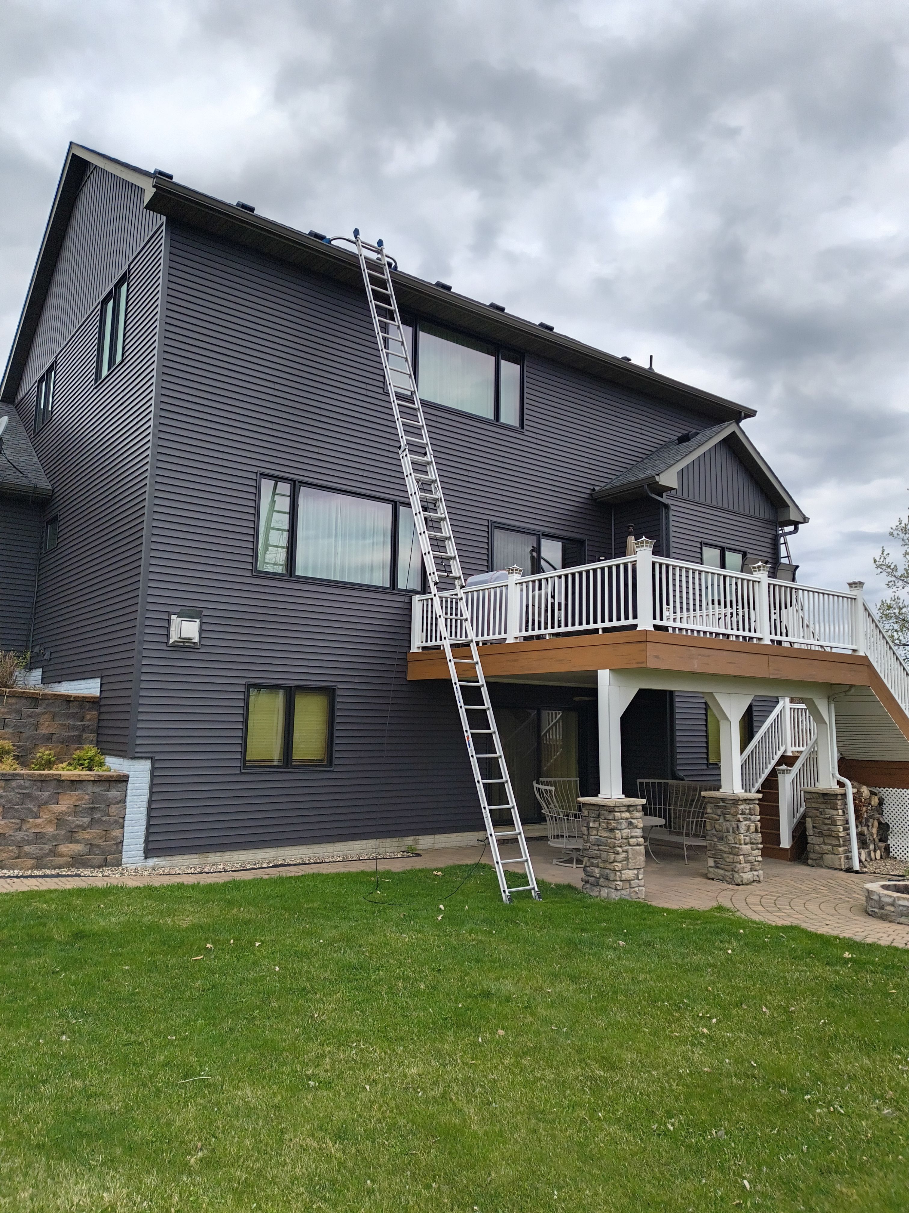 Seamless Gutter Installation in Waverly MN | 6” Gutters & Black Screen Gutter Guards by Next Level Seamless Gutters / Exteriors Inc.