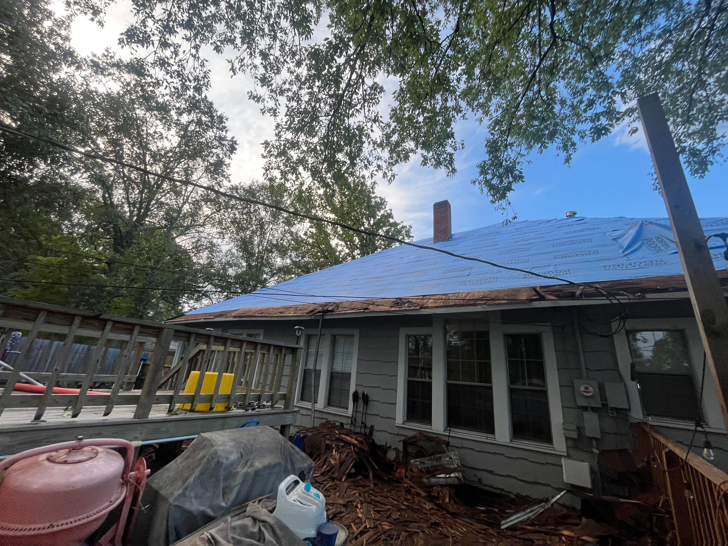 Residential Metal Roof Replacement using Reed's Metals: Colored Residental Panel (Burgundy) by Hostetler Roofing