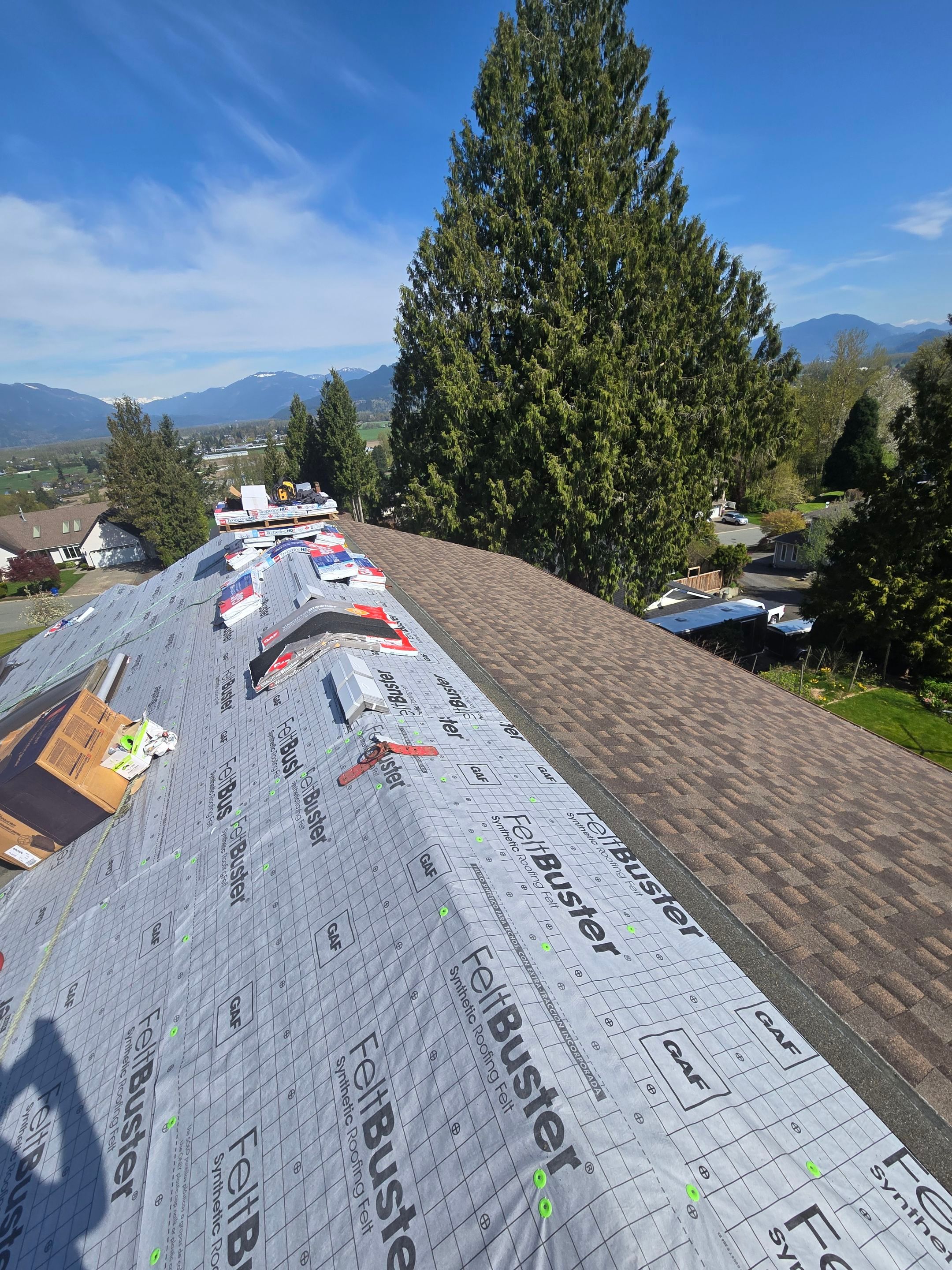Residential Re-Roof using Timberline HDZ Barkwood by Top Notch Roofing Inc