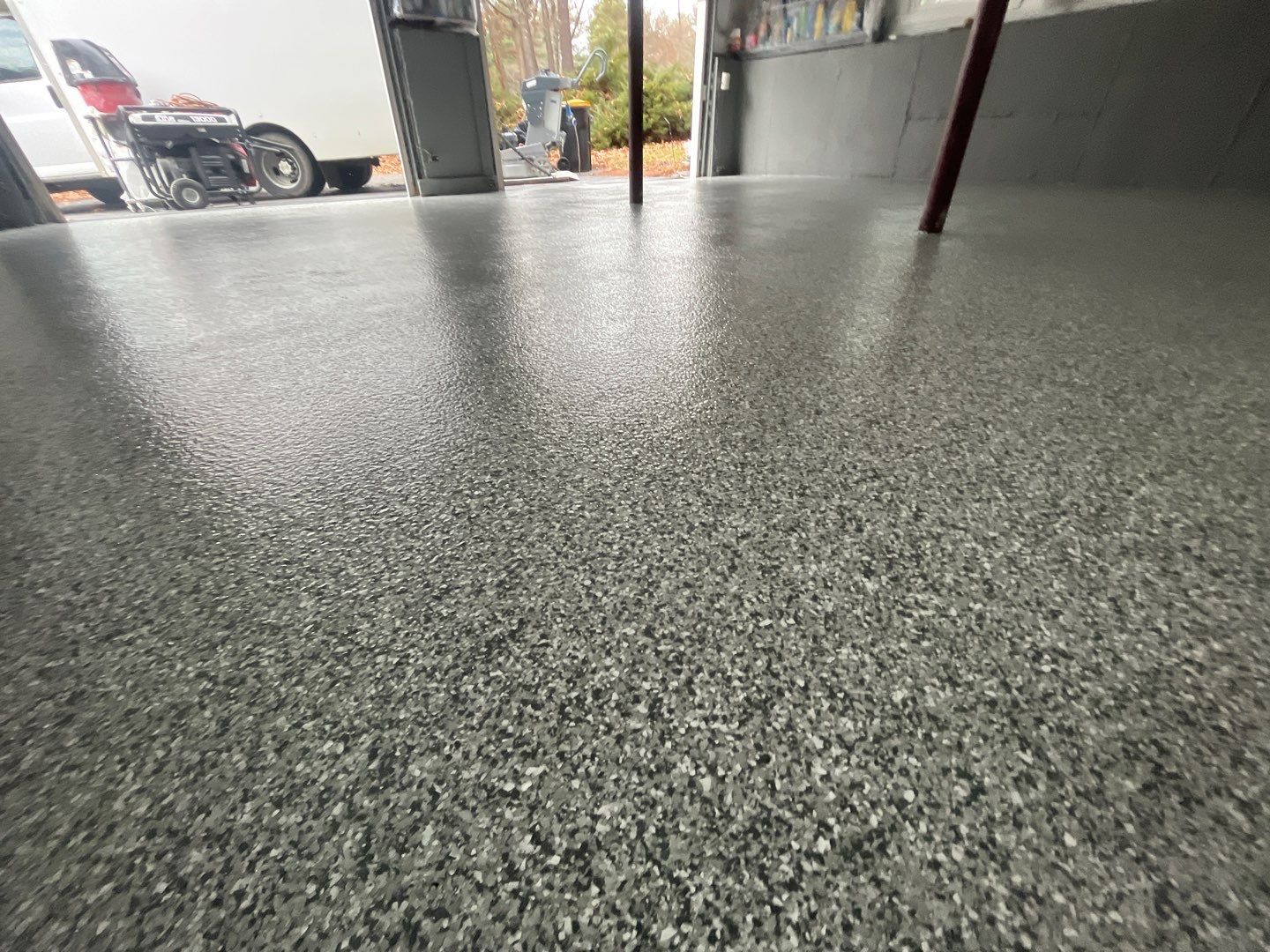 Maestranzi Garage TransFLOORmation by Symphony Concrete Coatings