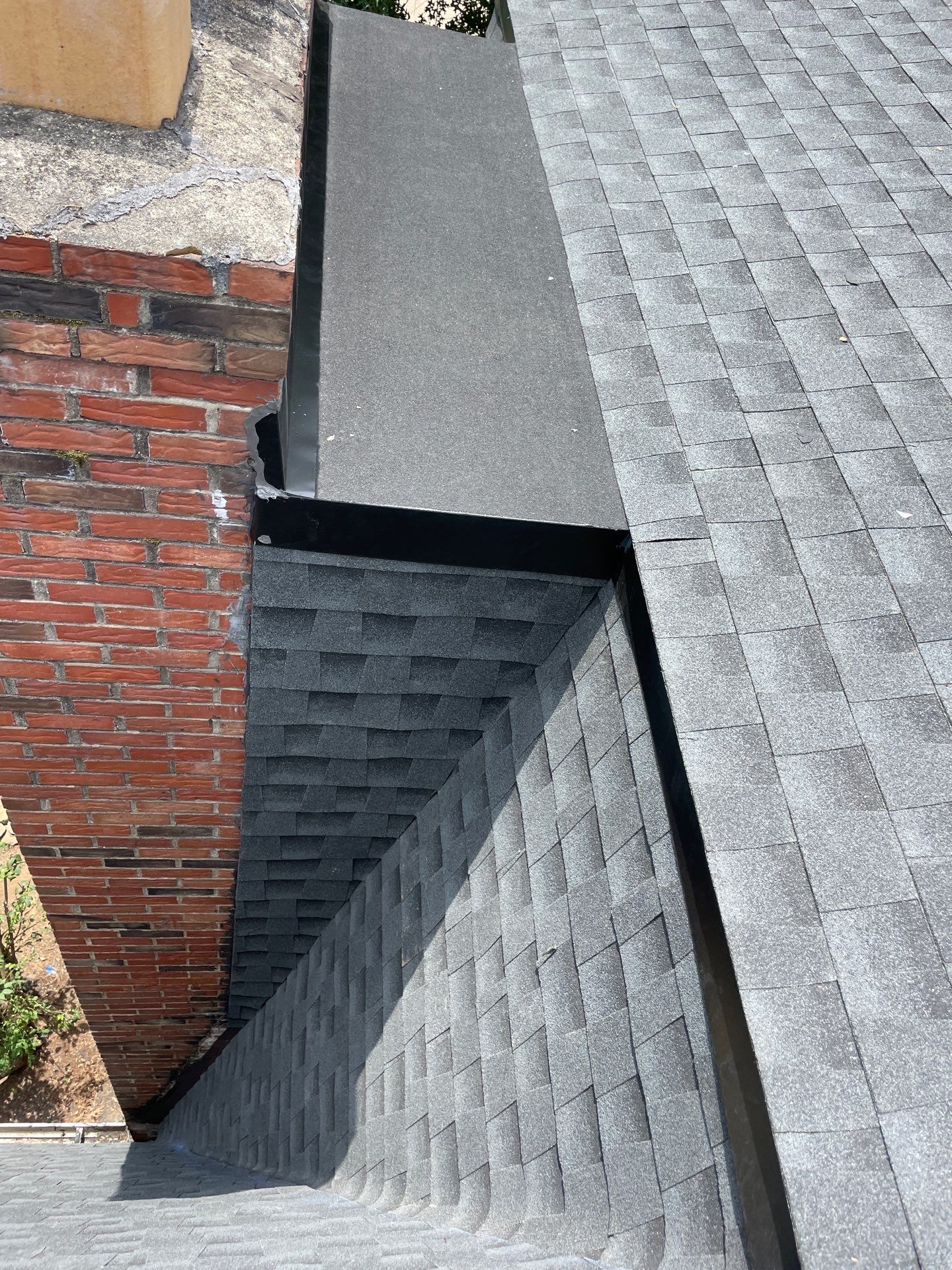 Residential Roofing Installation using GAF Timberline HDZ Charcoal by Rainstoppers Roofing