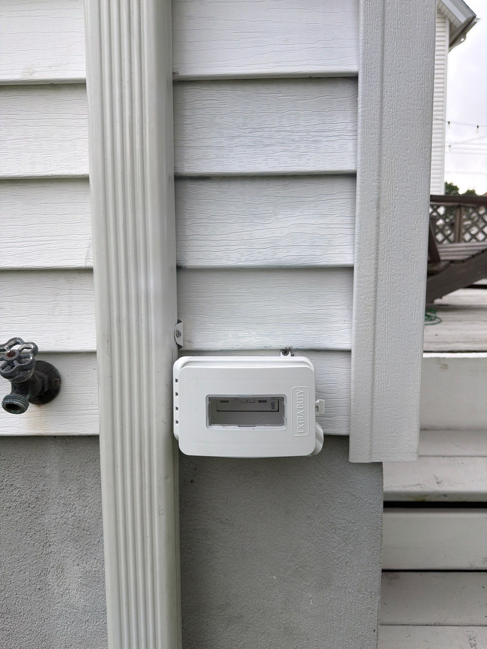 Fire-damaged exterior outlet repair by Spartan Home Pros
