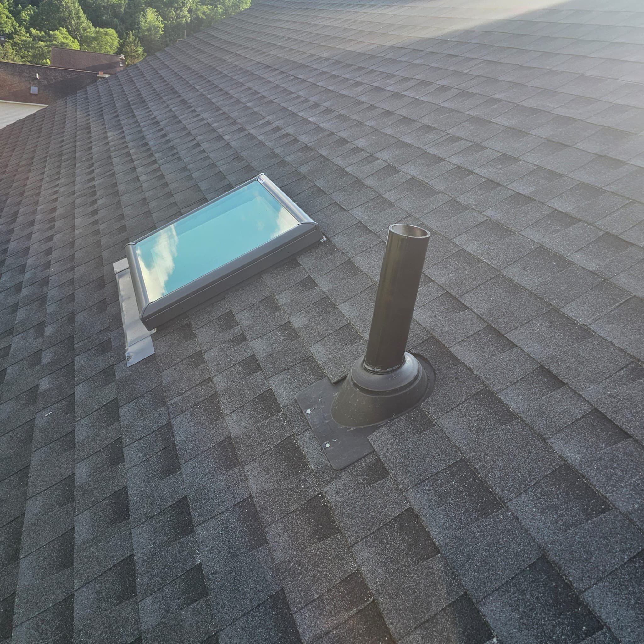 Residential Roofing Installation using GAF Timberline HDZ Charcoal by Rainstoppers Roofing