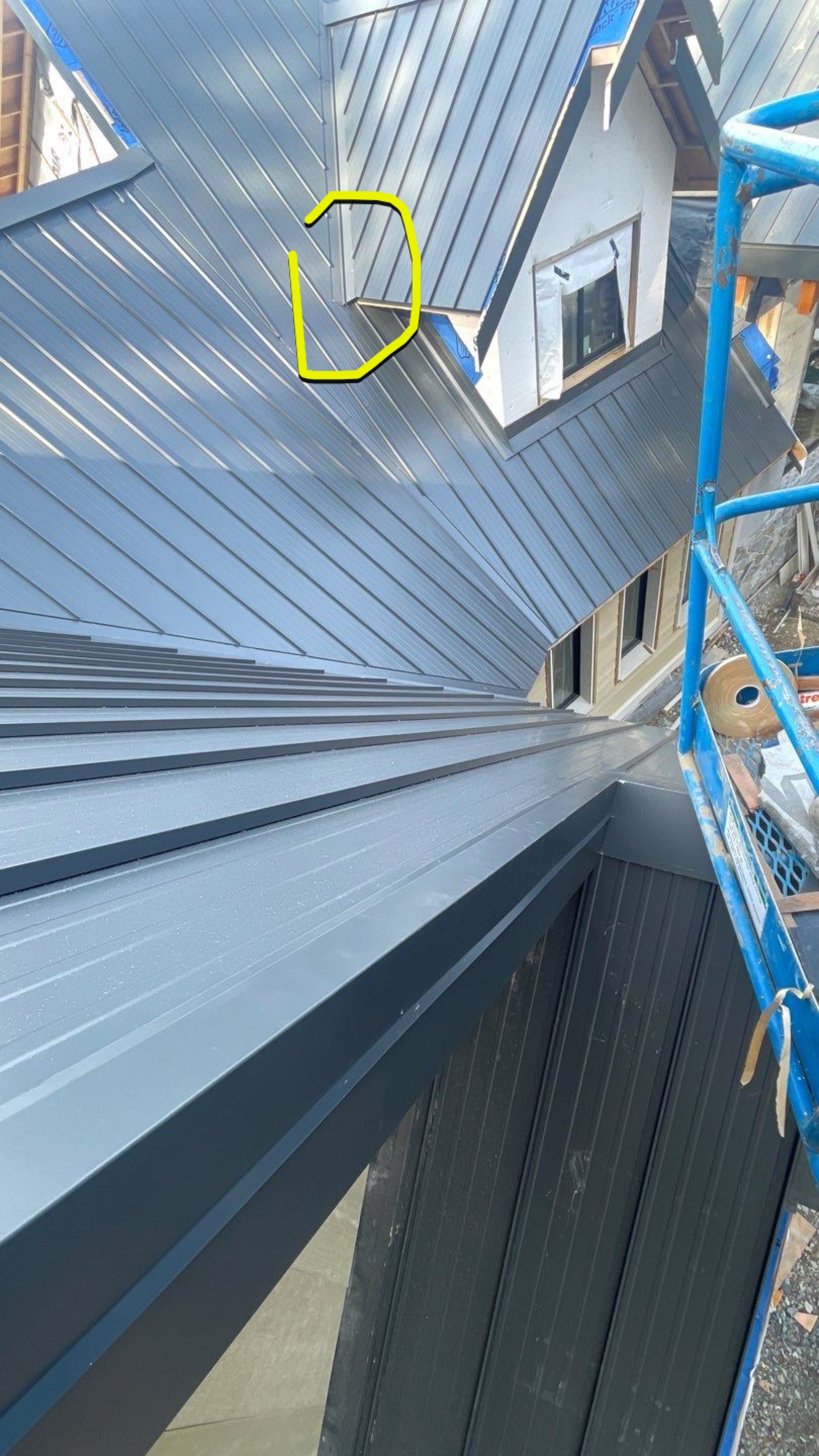 Residential Roofing Installation using 12" Prolok metal by Top Notch Roofing Inc