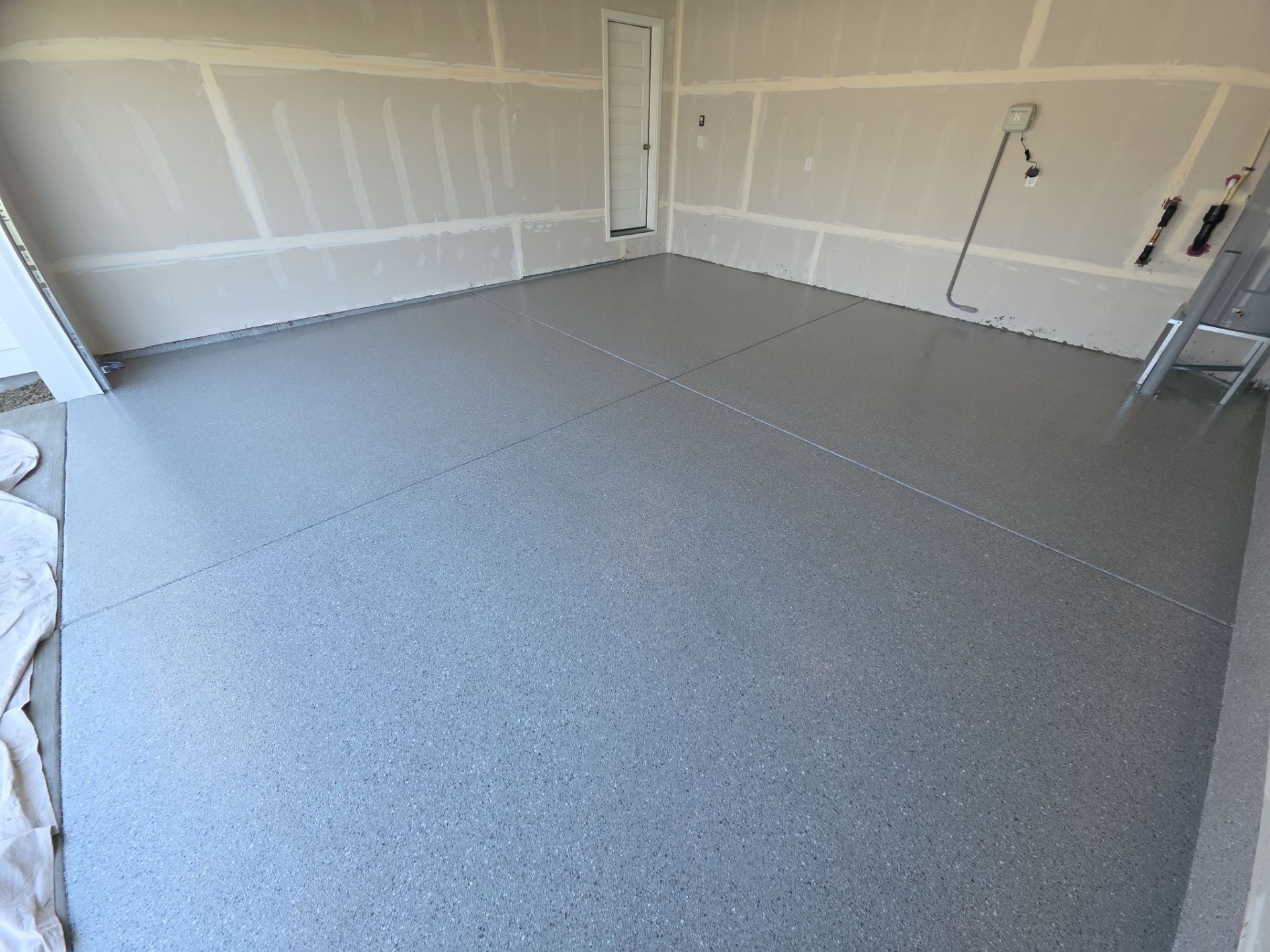 Garage Transformation using Battleship Hybrid by Croc Coatings, LLC
