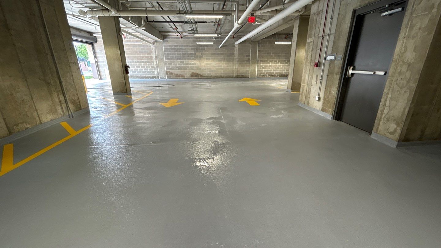 Parking garage using Hot water by Northern Power Washing LLC.