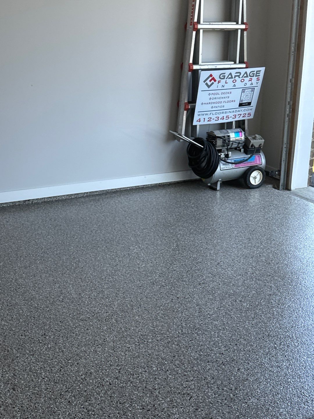 Porch + Garage Project in Washington by Floors in a Day, Inc