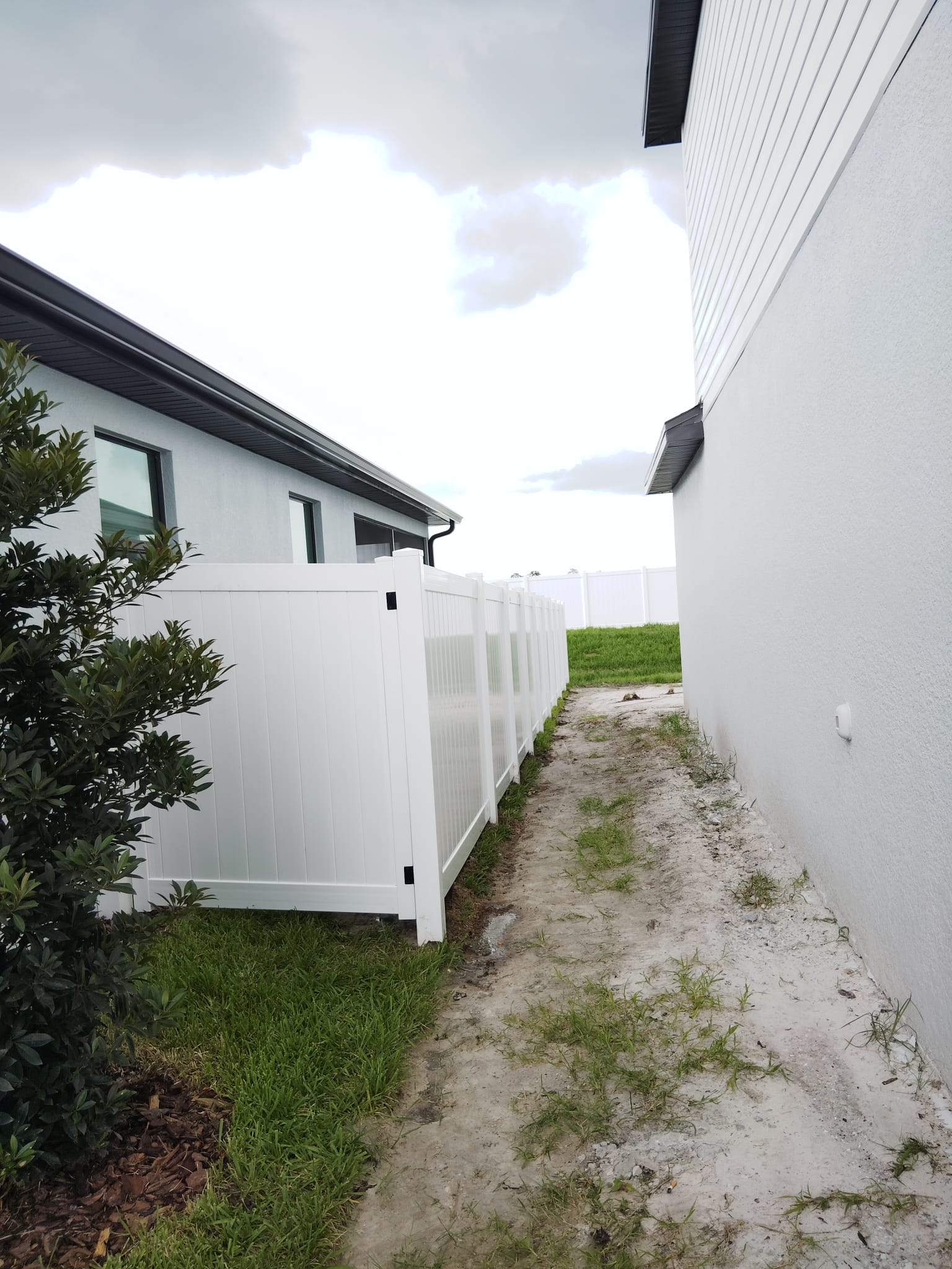 White Vinyl Privacy Fence Installation for North Port Residential Property by True Fence LLC