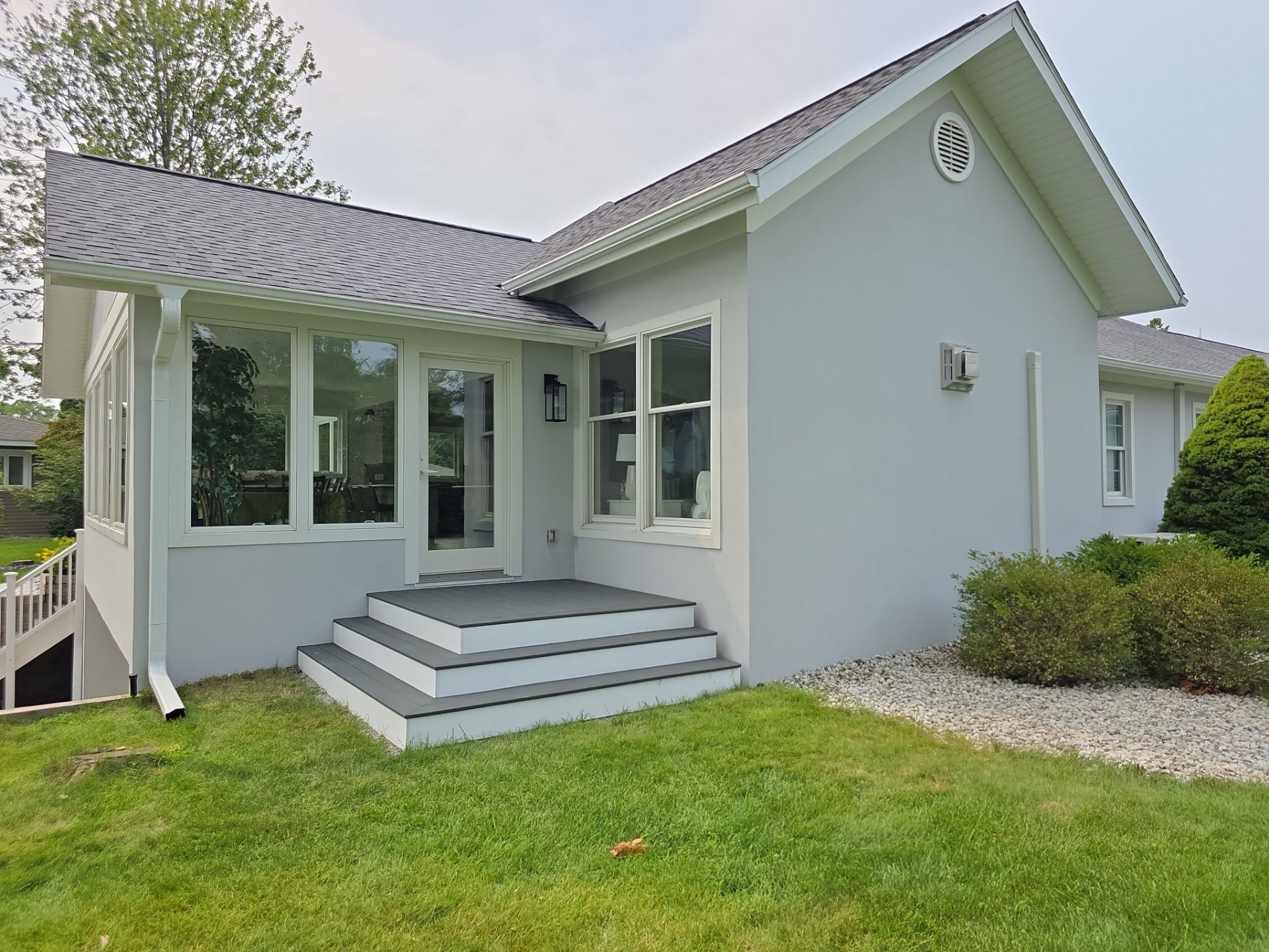 Norton Shores Residential Stucco Repair and Exterior Painting Refresh by Gordon Painting