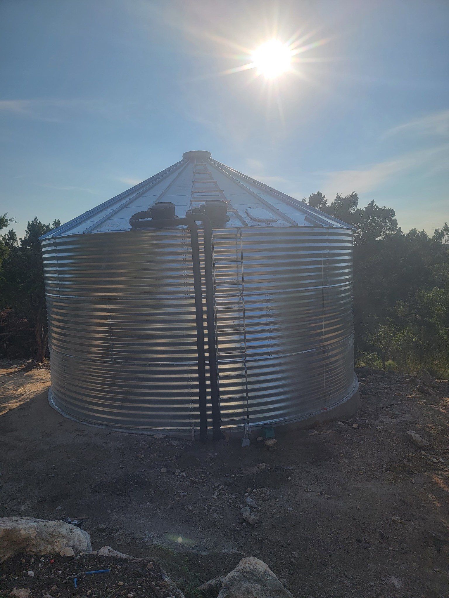 Cliffside installation for primary water source. by Hill Country Rain Water