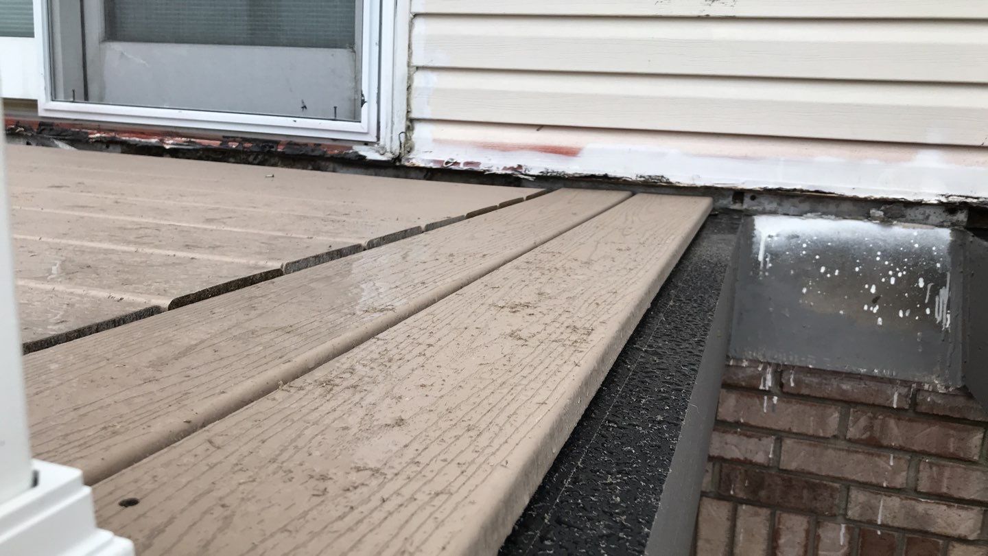 Deck Refurbush and Door Replacement using Trex Decking and Railing.  Polaris Patio Doors by Secure Construction Company Inc