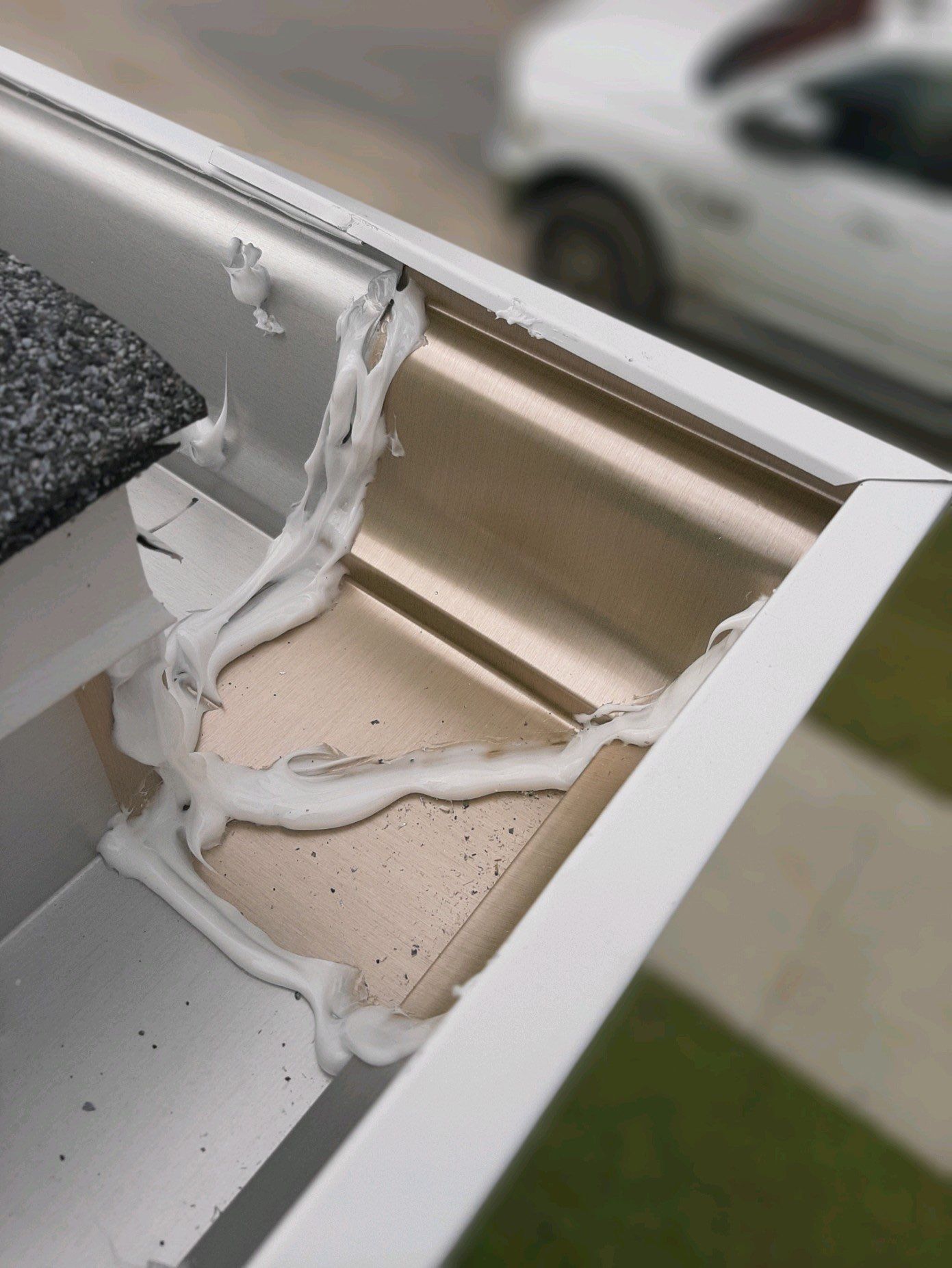 Seamless Gutter Installation using White K-Style Gutters by Gutter Professors