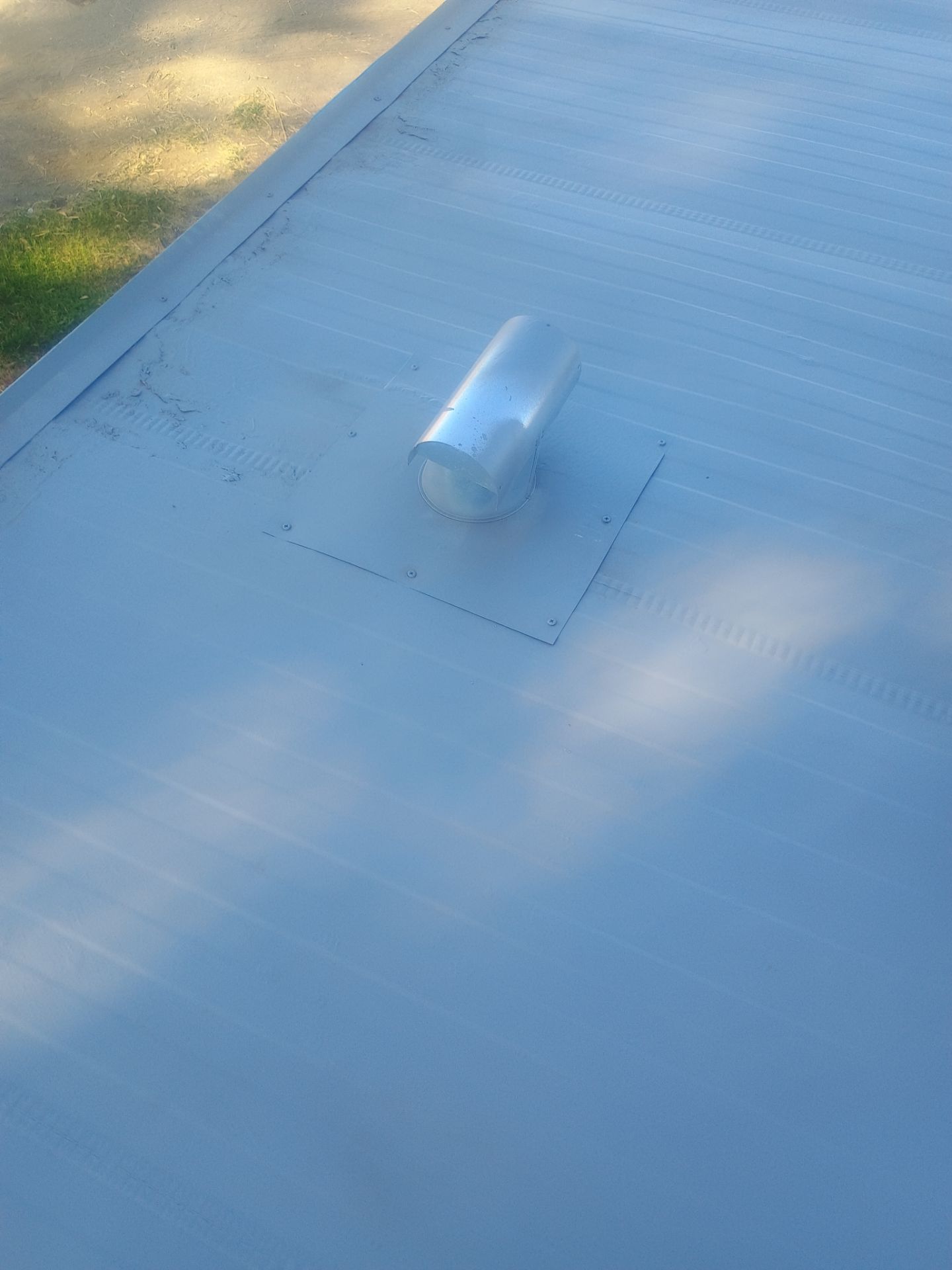 Foam and coatings on mobile home by Straight Edge Roofing Inc