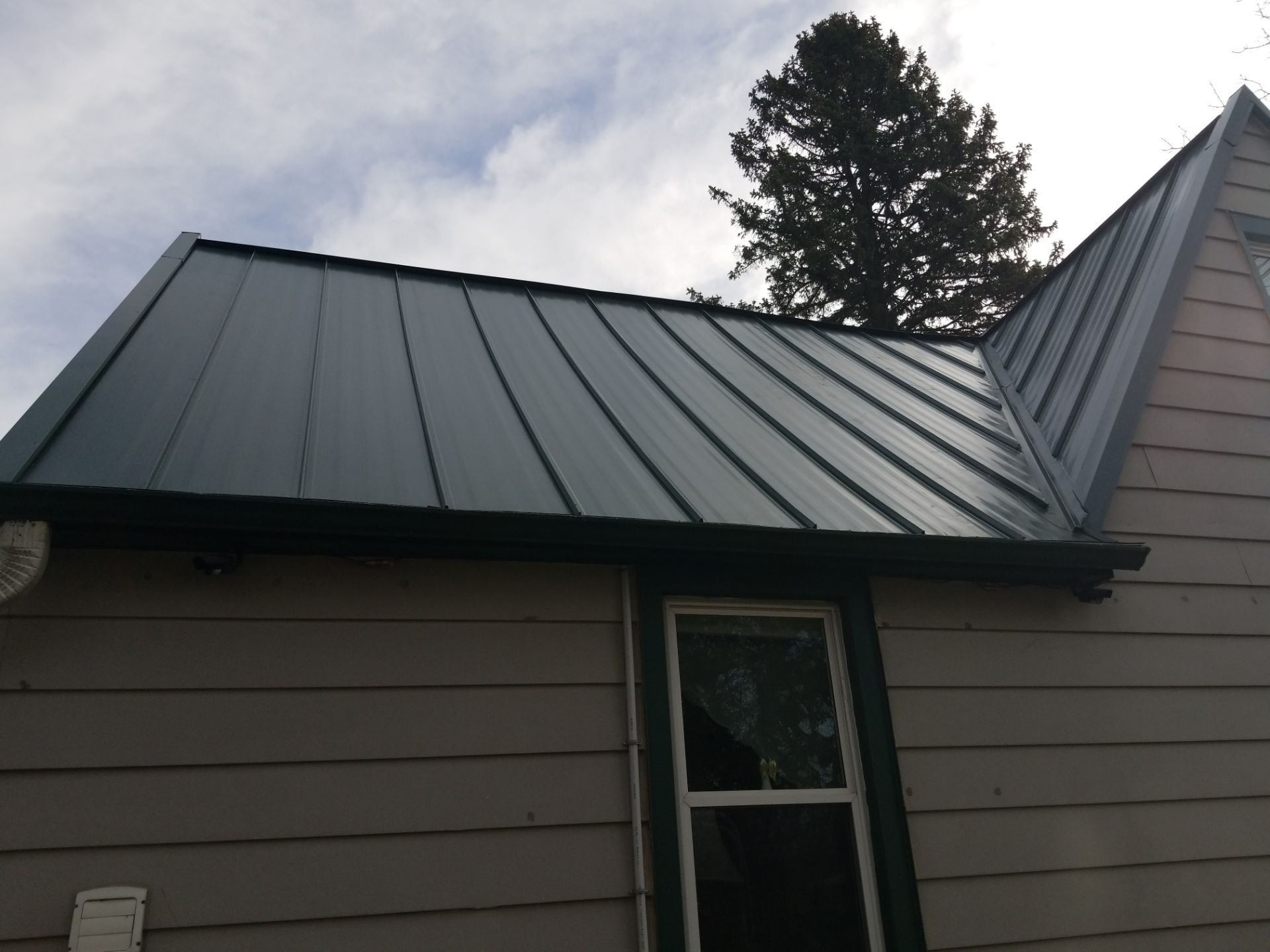 *Expert Standing Seam Metal Roof Installation in Slinger, Wisconsin** by Total Restoration Services