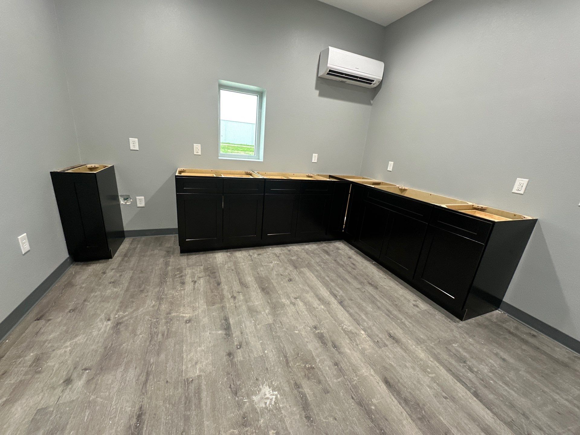 Commercial Efficiency: Warehouse Kitchen & Guest Area Cabinet Installation by Tibi Soli LLC