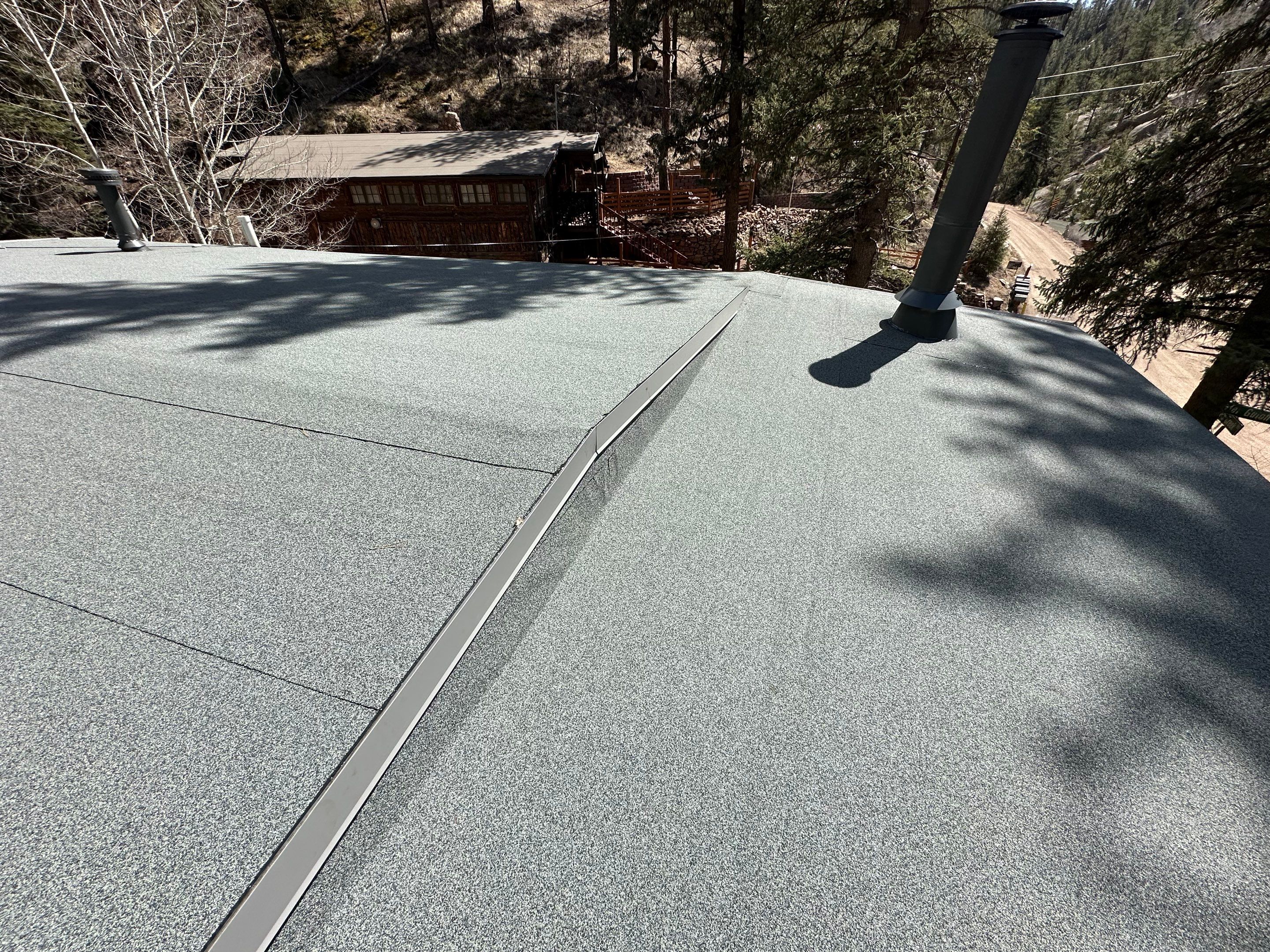 Residential Roofing Installation using Modified Bitumen Roofing by Blue Peaks Roofing LLC 