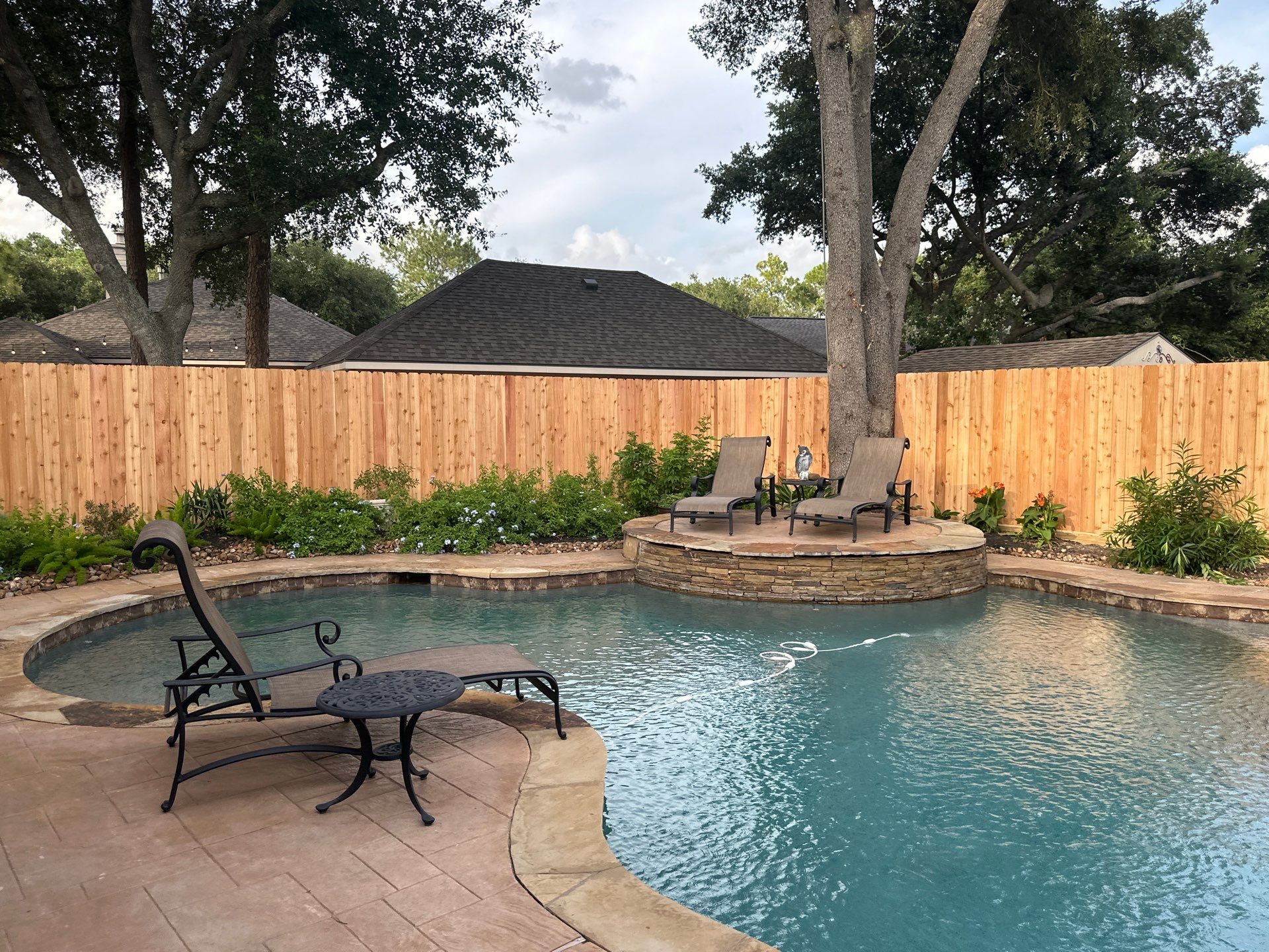 Wood fence project in Cypress by Tim's Fences
