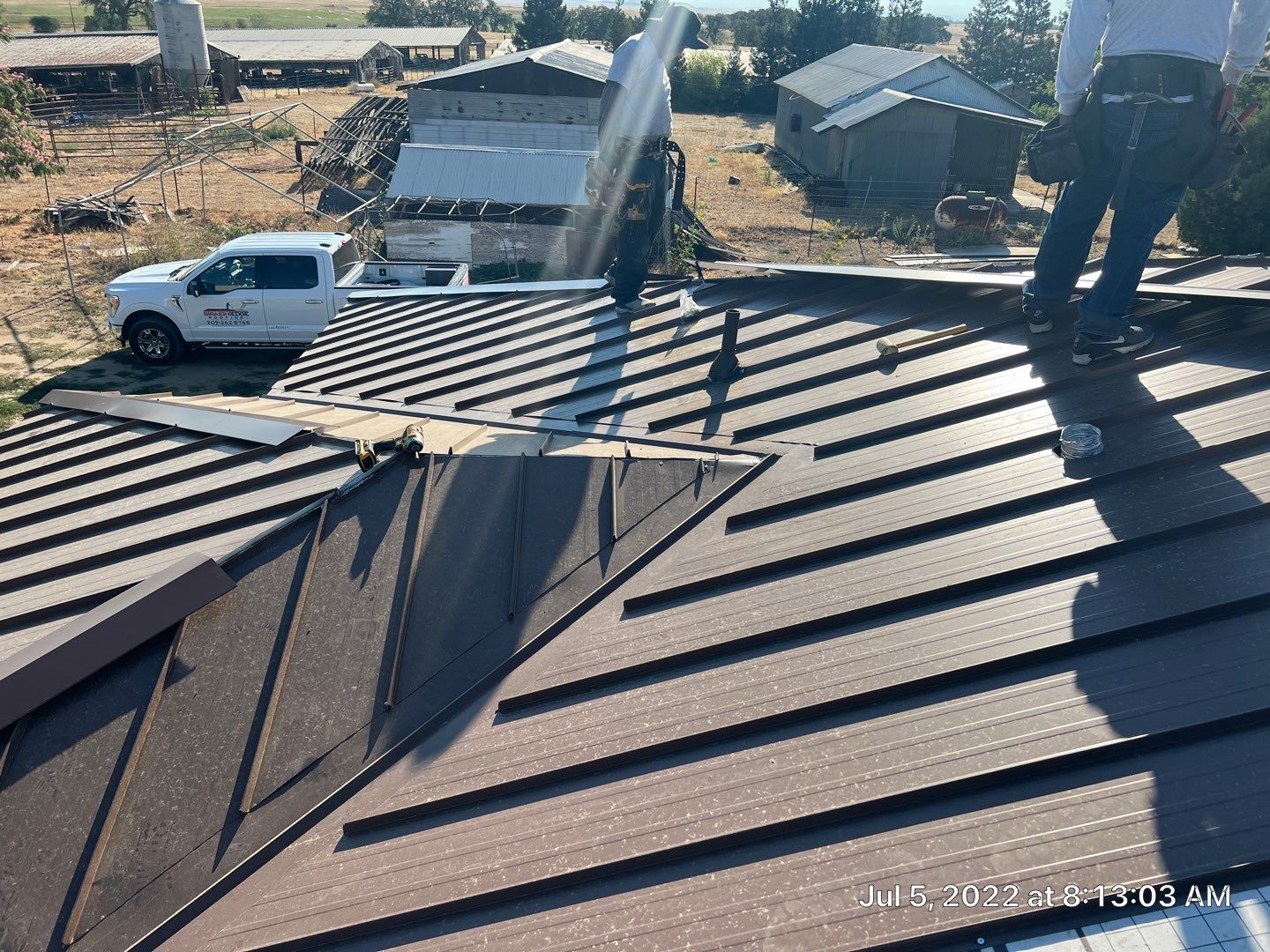 Metal roofing installation using Standing seam metal roofing system by Straight Edge Roofing Inc