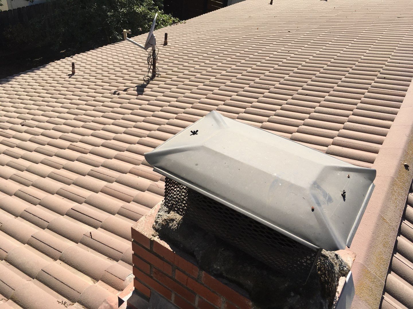 Tile roof remodel/ install OSB sheathing under tile and replace using OSB board with new underlayment, tile, and battens by Straight Edge Roofing Inc