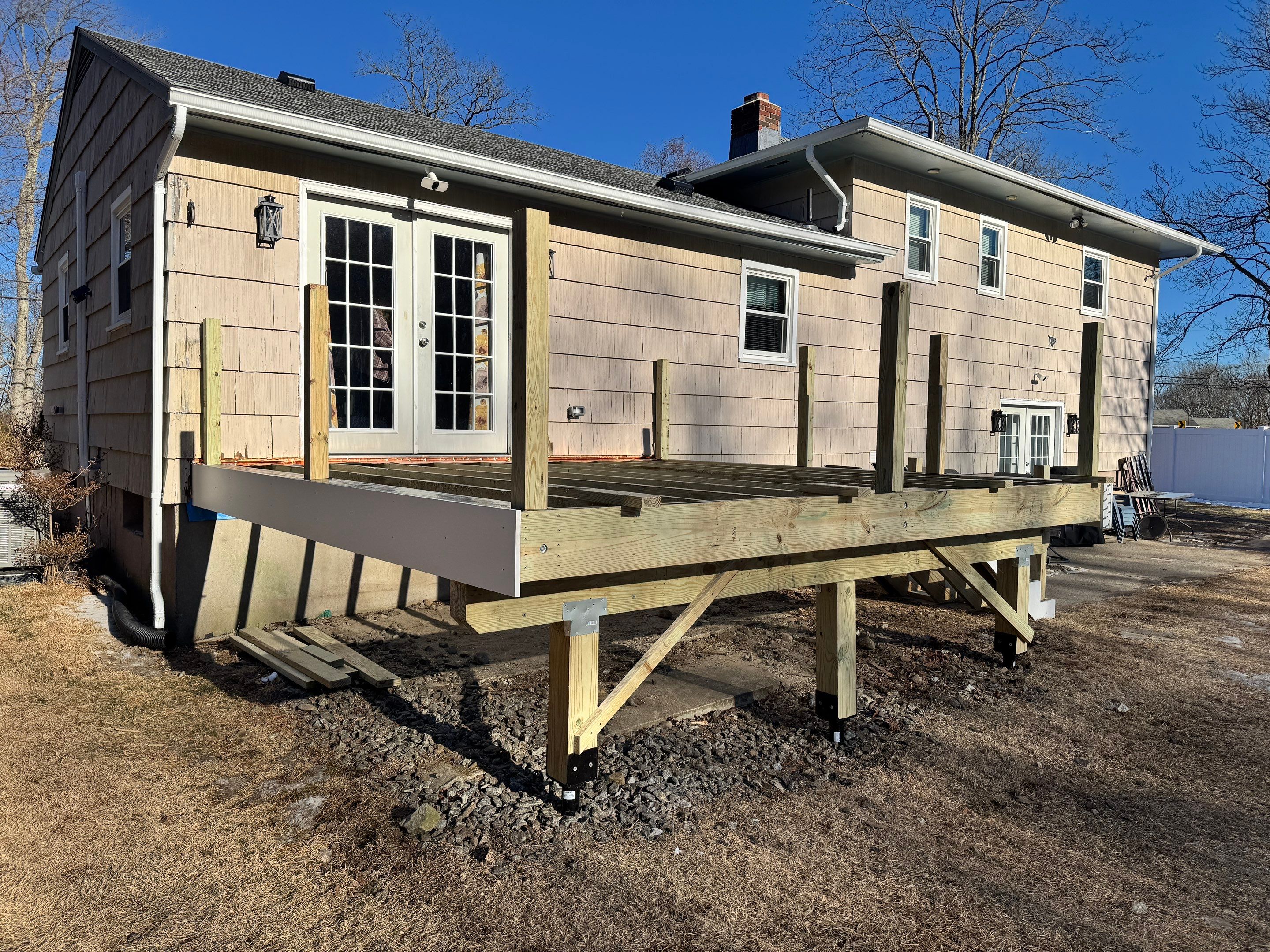 Deck replacement using Trex Lineage Rainier , and Transcend White railing.  by DiGiorgi Roofing and Siding Inc