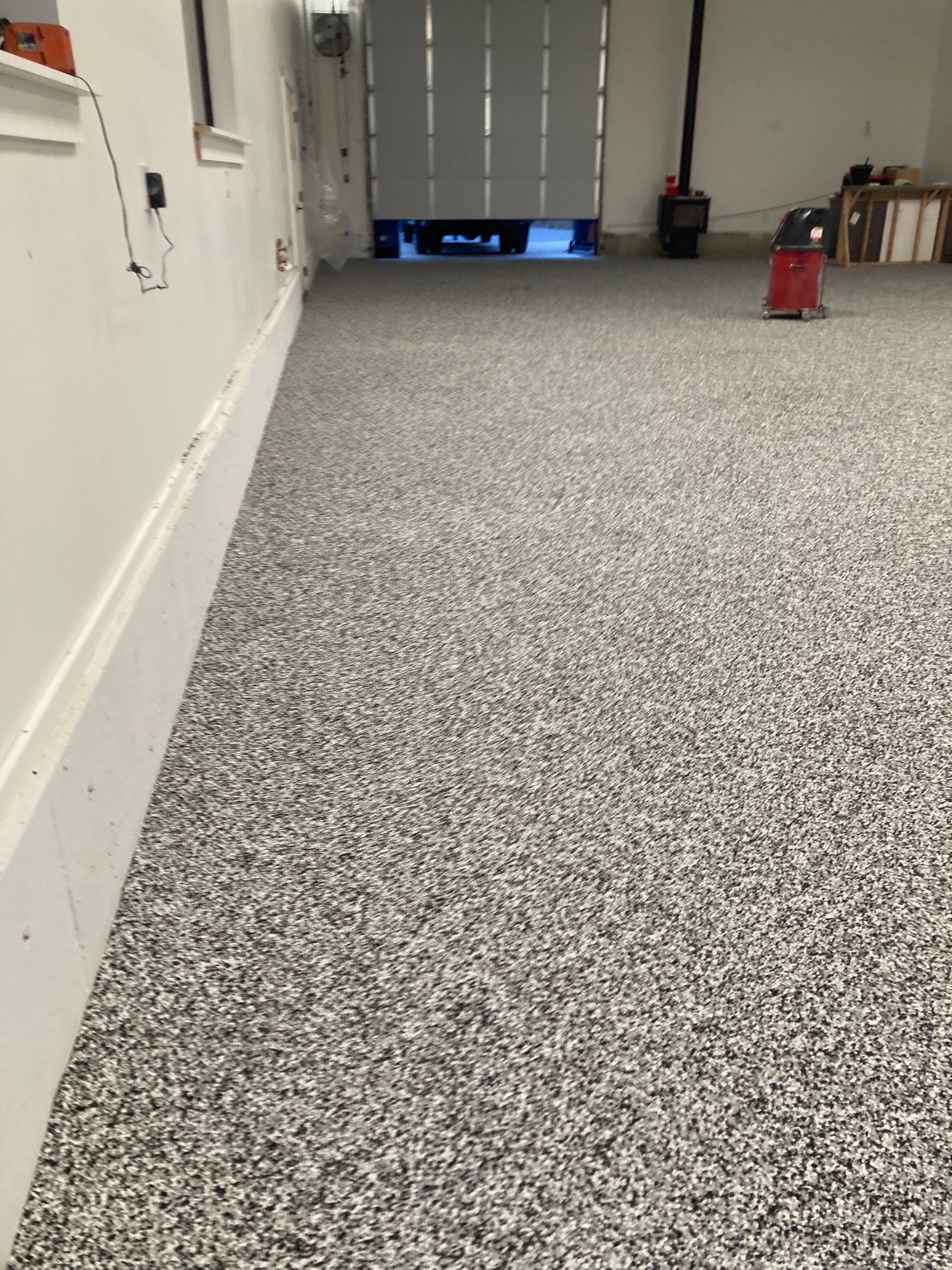 Garage Transformation using Domino and the Penntek Evolution System by Croc Coatings, LLC