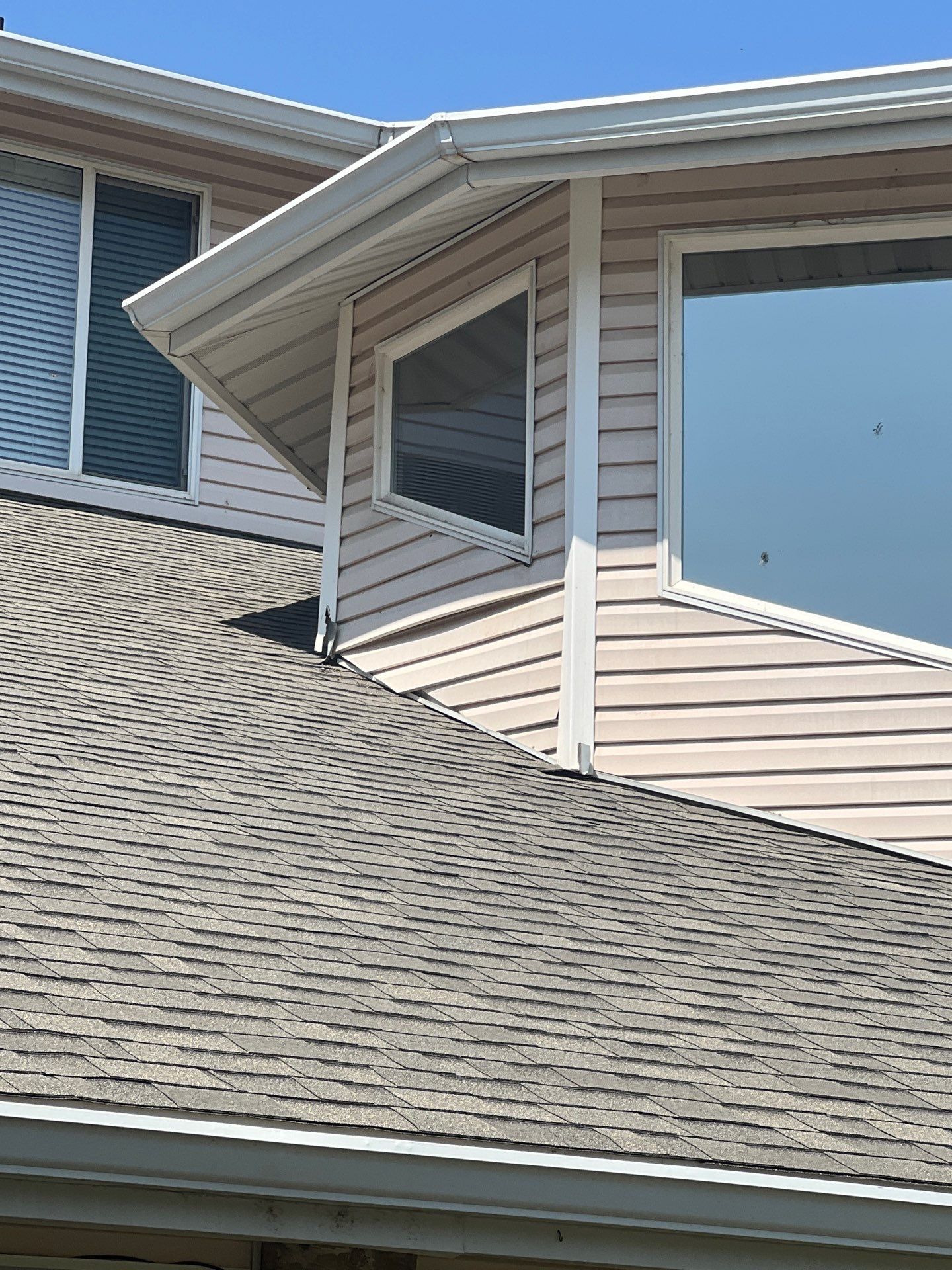 North Logan | Custom Aluminum Parapets & Designer Vinyl | Sand by Ideal Siding Utah