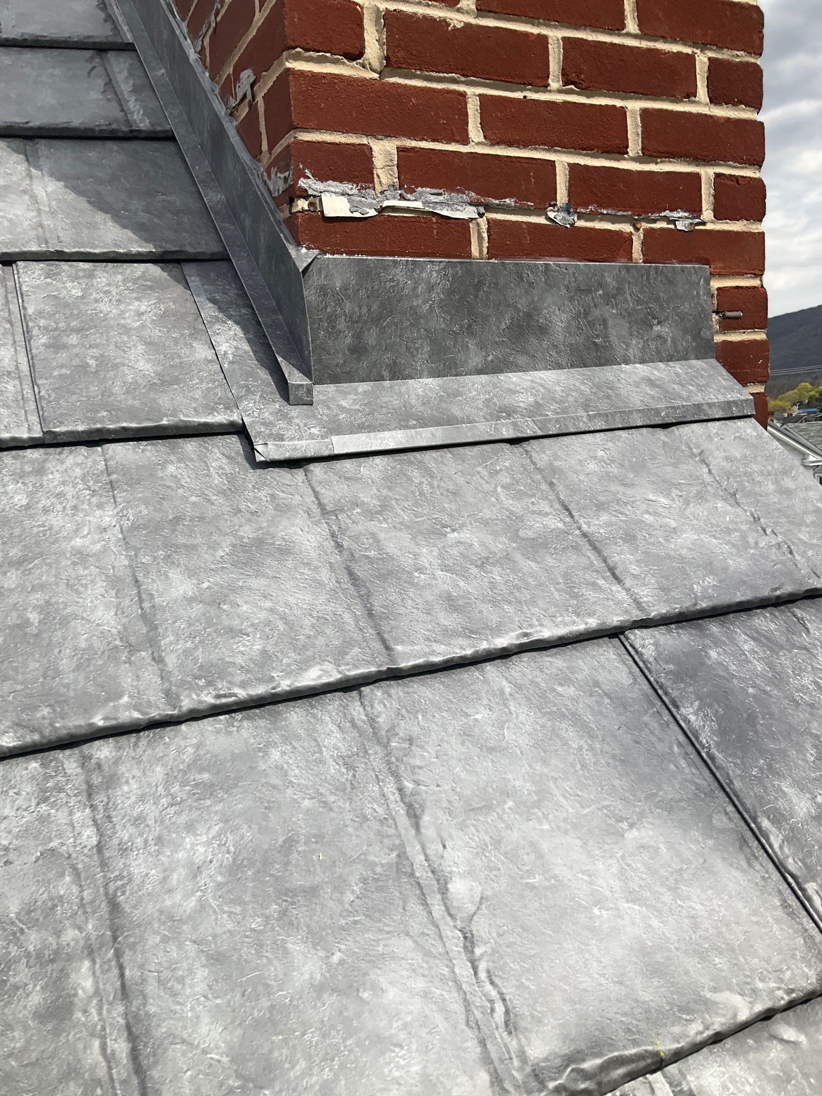 Ironstone Metal Slate Installation by Esh Builders