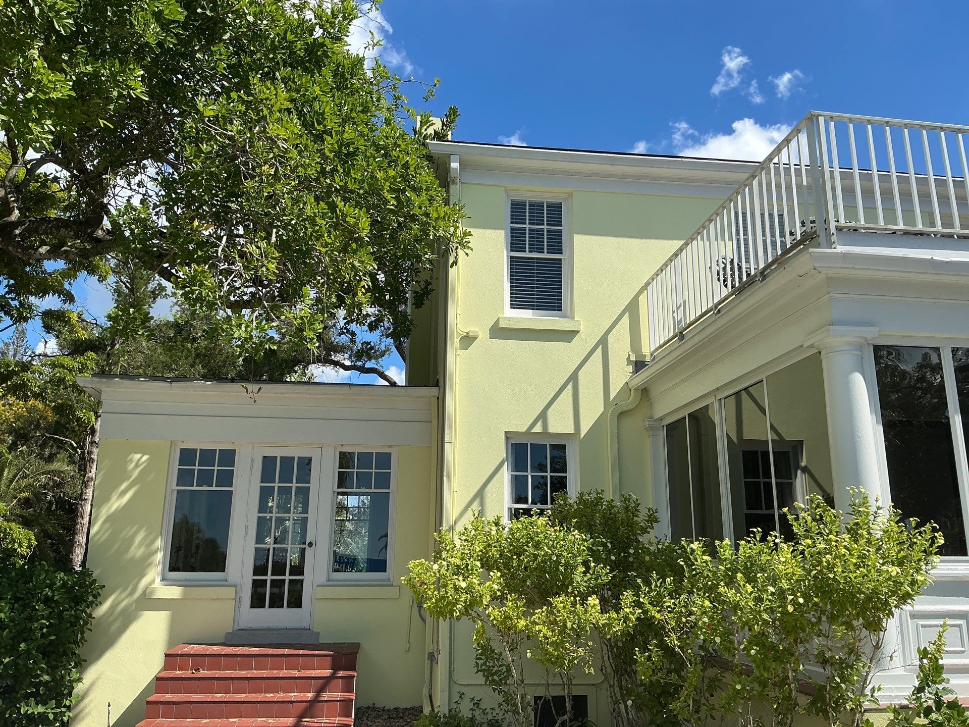 Clean Gutters and Roof in Sarasota FL by Gutter Professors