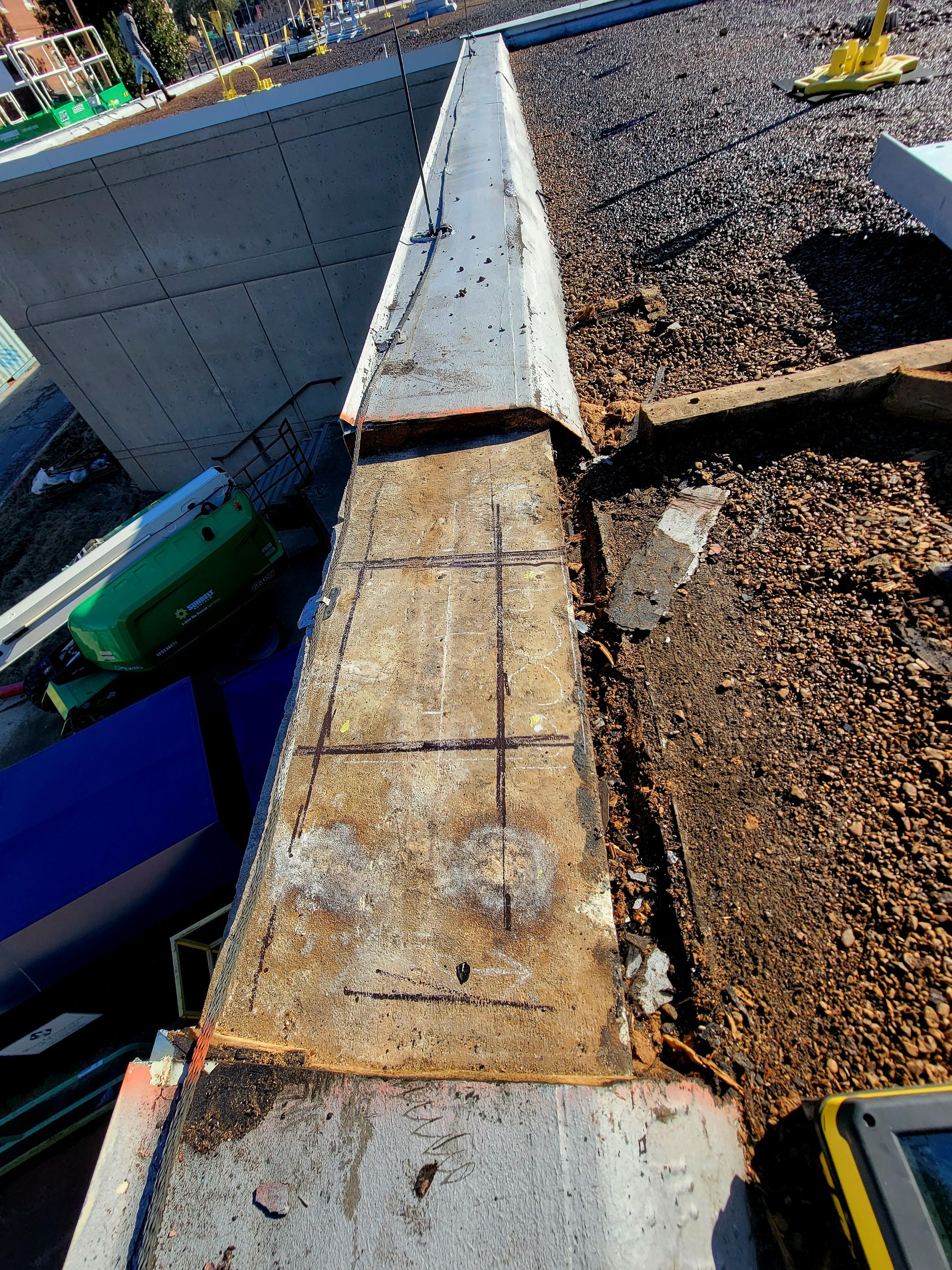 Scanning a roof section for rebar by Alsip Locating Service, LLC