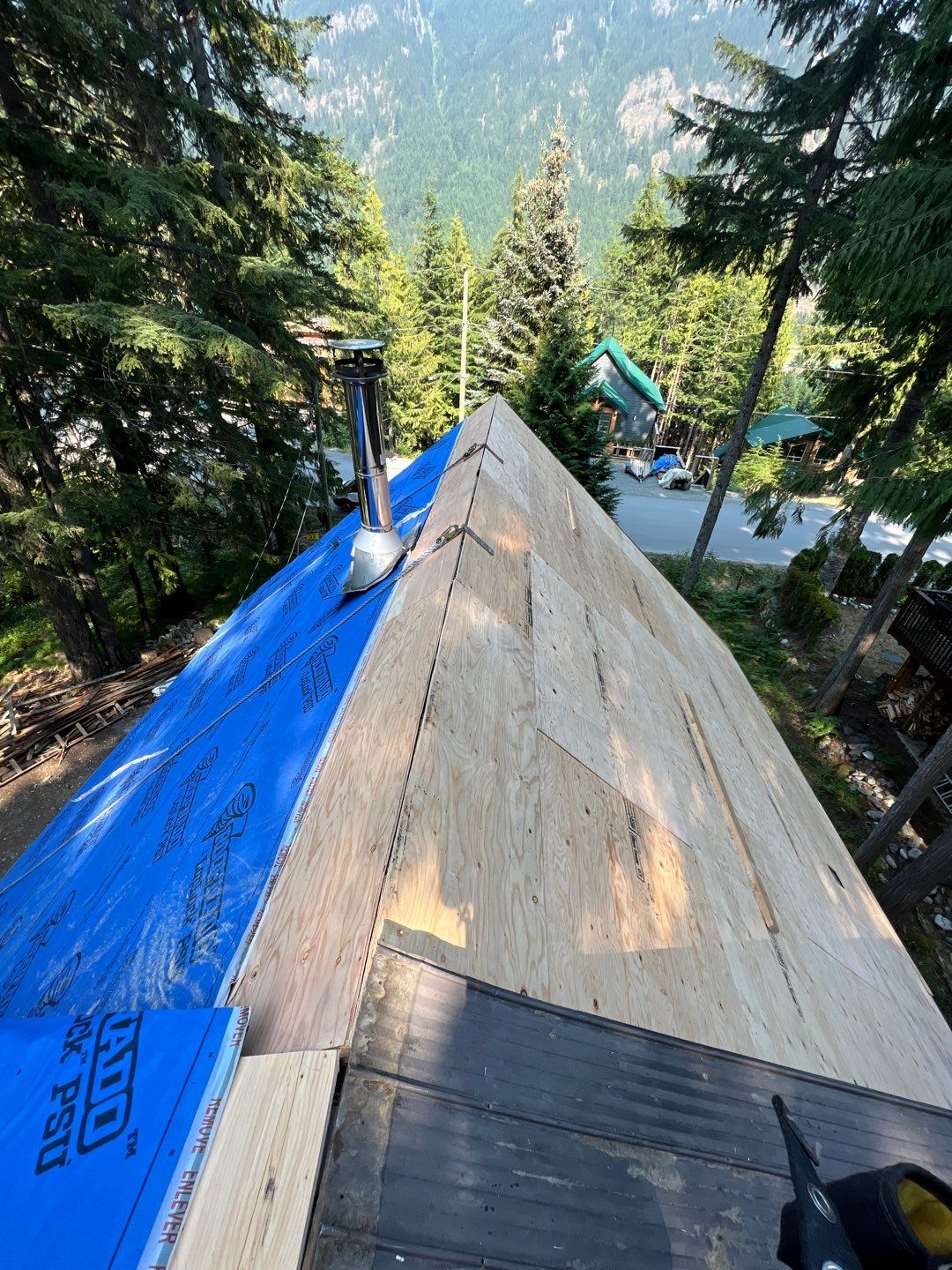 Residential ReRoofing Installation using 12" Prolok metal  by Top Notch Roofing Inc