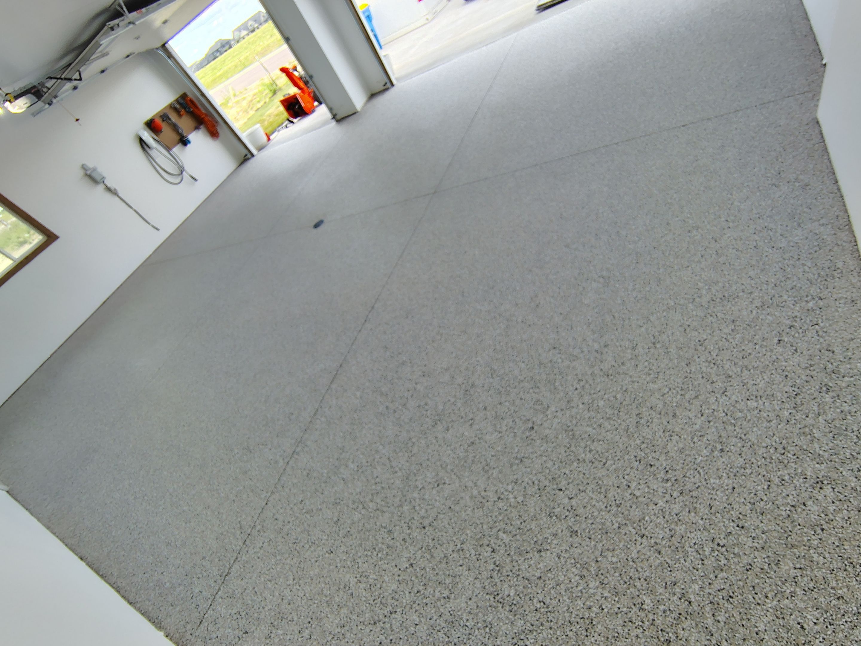 Gray and White Speckled Epoxy Garage Floor Coating in Tea by Select Painting, Coatings & Garage Cabinets