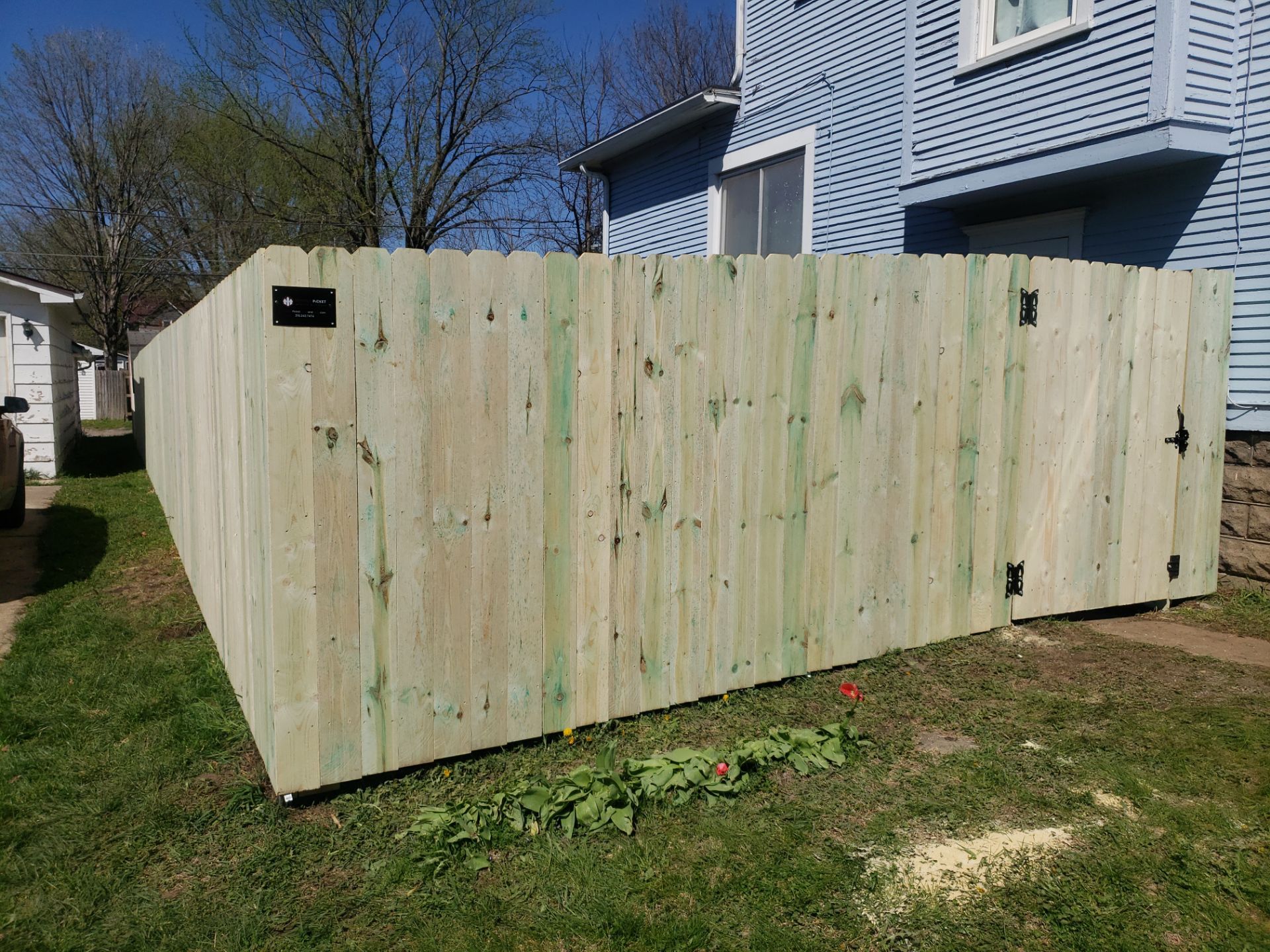 Pressure-Treated Wood Privacy Fence Replacement in Waterloo by Perfect Picket Fence and Stain
