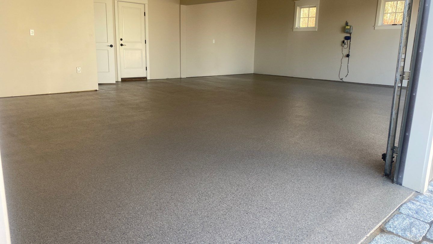 Garage in Bedford, NH 03110 by Symphony Concrete Coatings