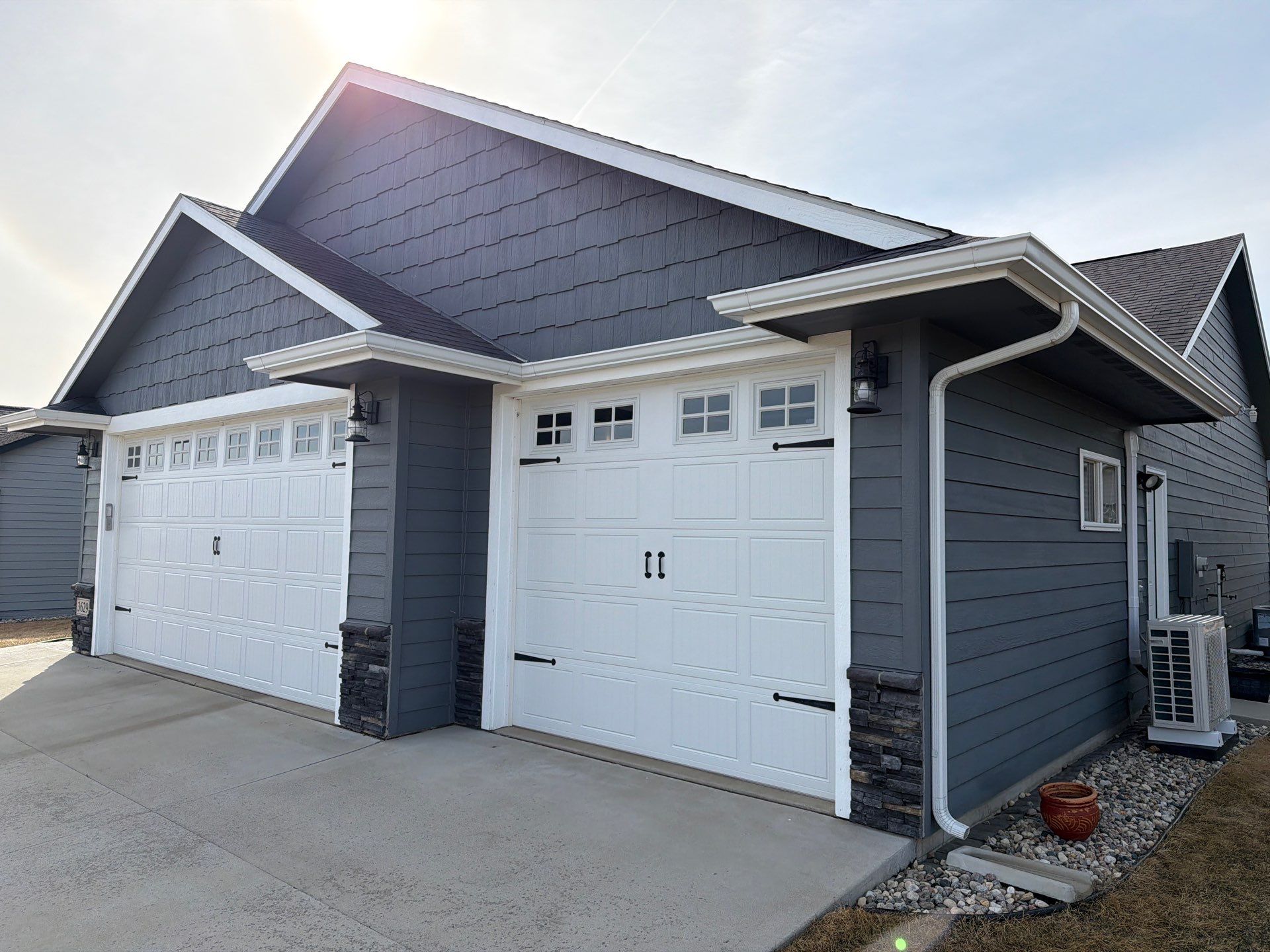 Residential Exterior Painting and Siding Refresh in Sioux Falls by Select Painting, Coatings & Garage Cabinets