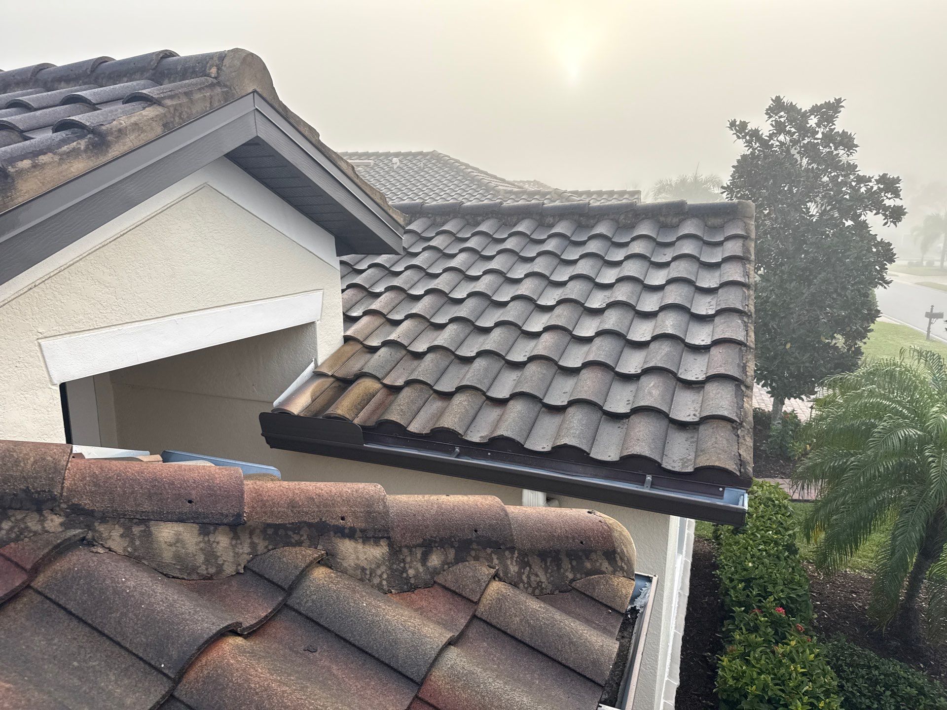 Barrel Tile Roof Cleaning & Paver Driveway Cleaning in River Strand at Heritage Harbour | Bradenton, FL by Sunshine AquaWash