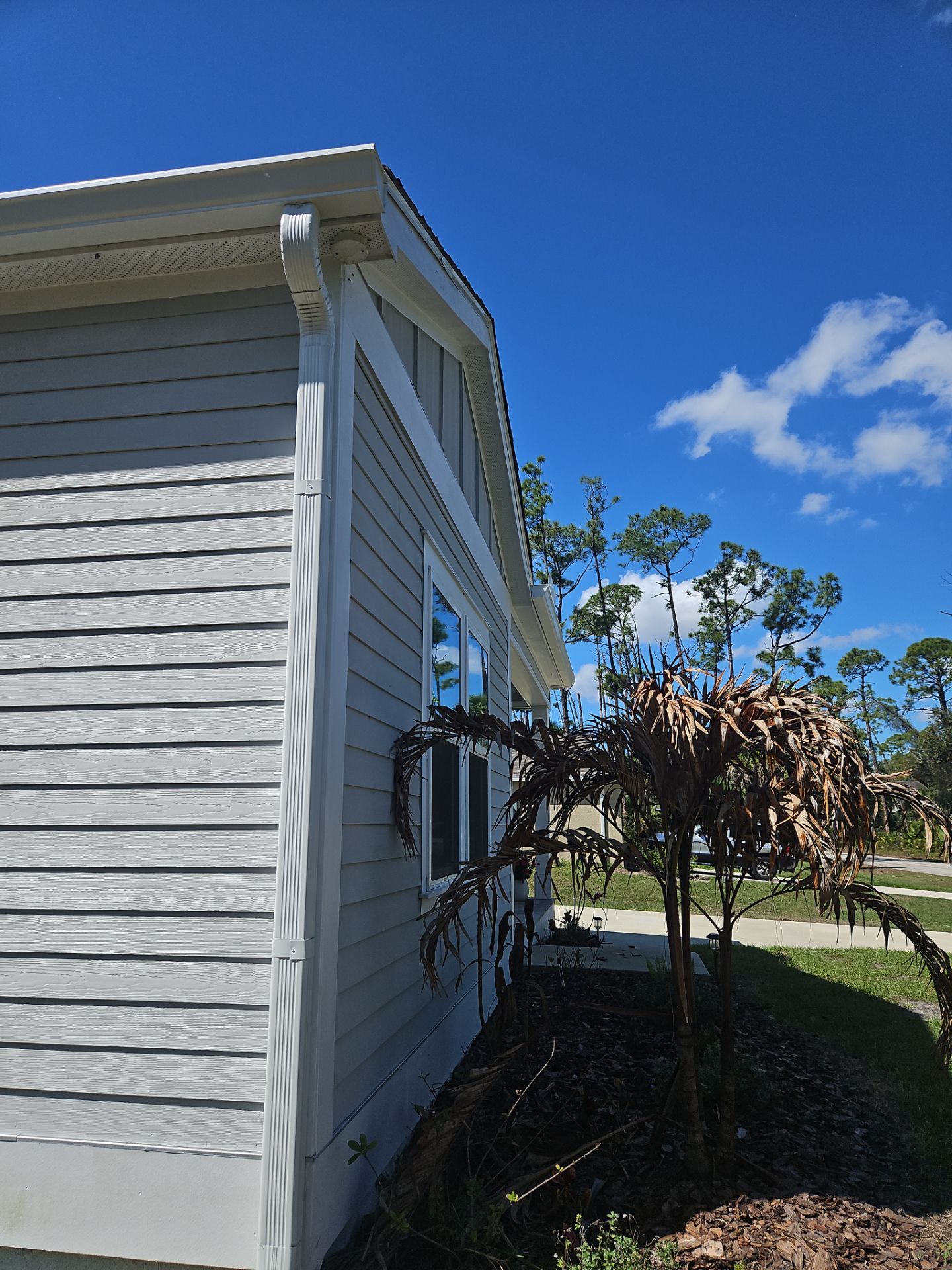 Downspout Installation using 3X4 Elbow Downspout in Port Charlotte FL by Gutter Professors