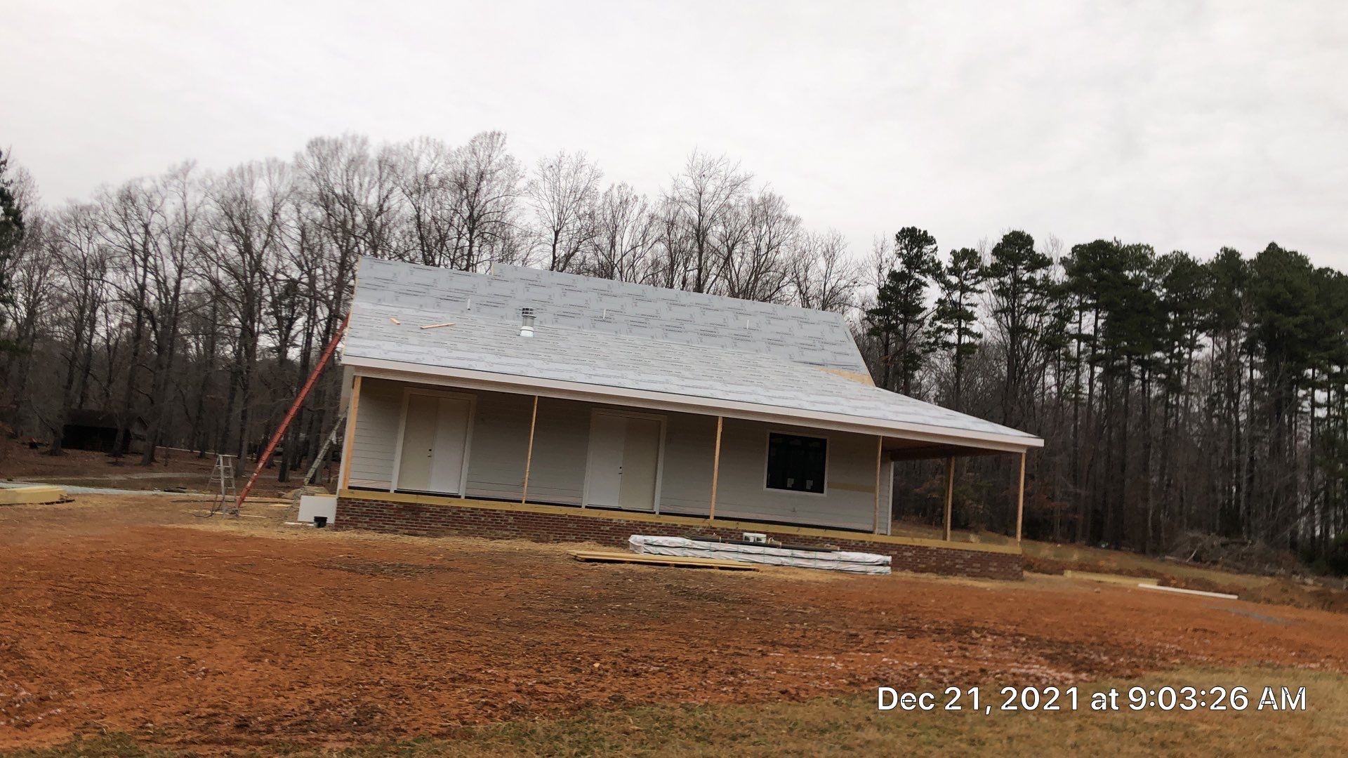 Custom Home Metal Roof Installation by Just In Time Roofing and Restoration