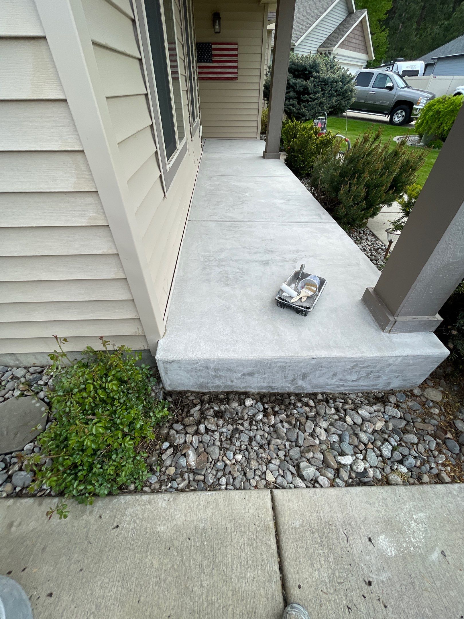 Garage Transformation using Pebble Beach and Front Porch using Greystone by Croc Coatings, LLC