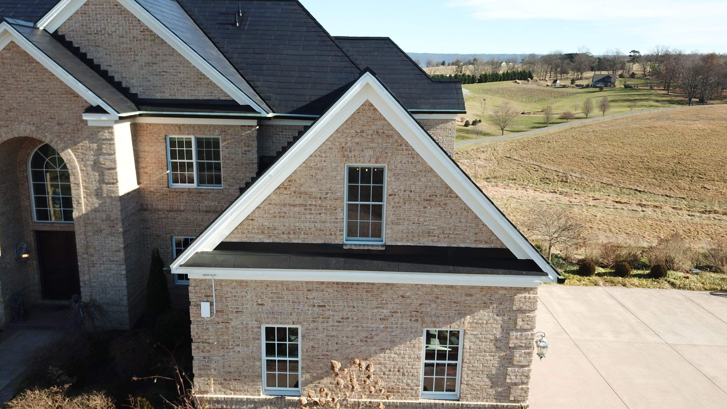 Tesla Solar Roof Replacement  by American Home Contractors