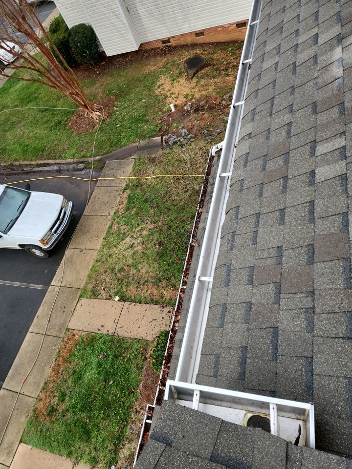 Gutter Cleaning using water by G&H Home Tech Pros LLC
