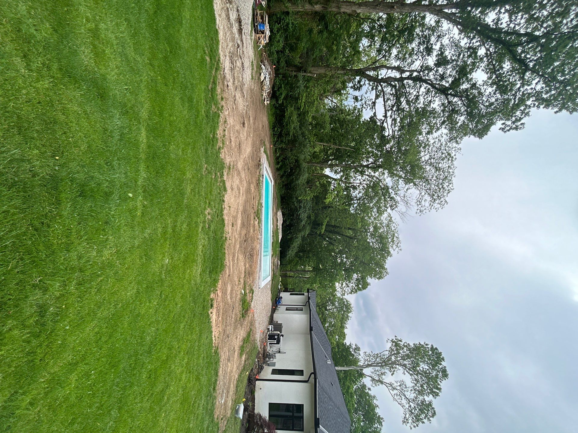 High-End Residential Turf Surrounding Pool in Powell by Southwest Greens Midwest