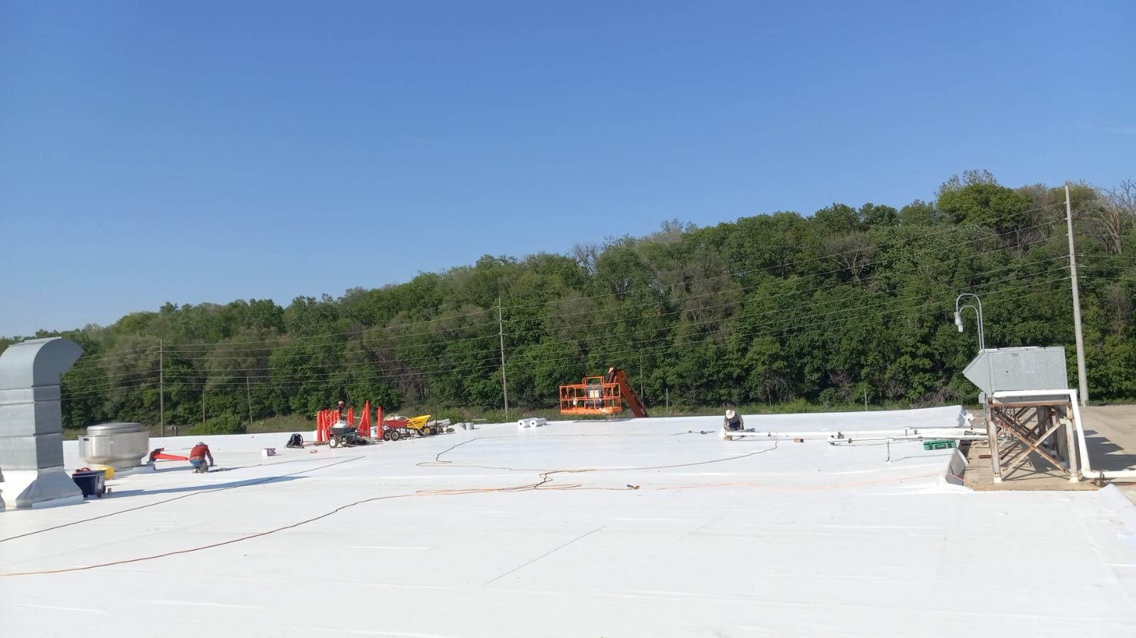 AML Riverside  by Grell Roofing, LLC