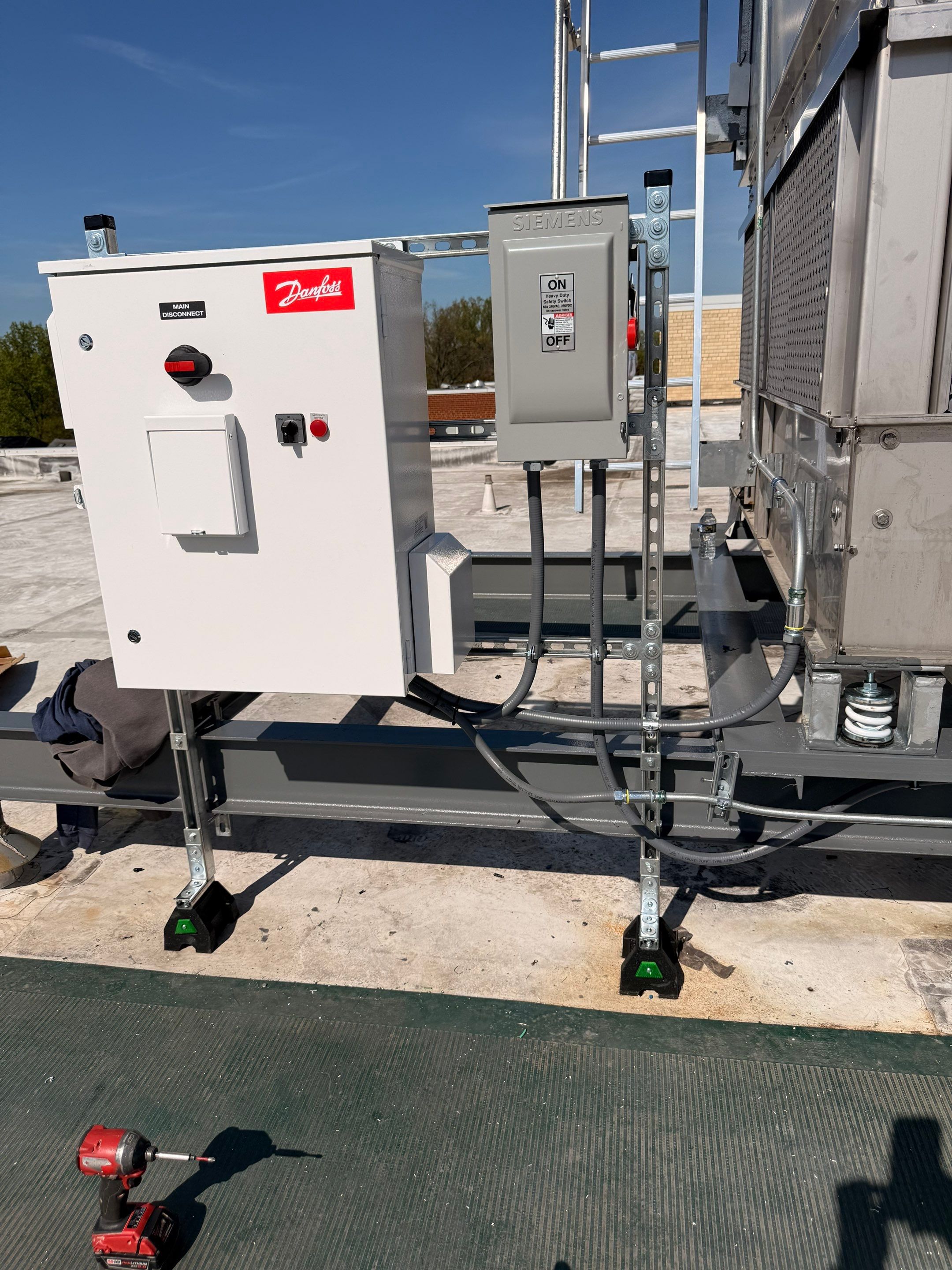 Electrical VFD installation for cooling tower at condominium in Falls Church. by Complete Tradesmen Services