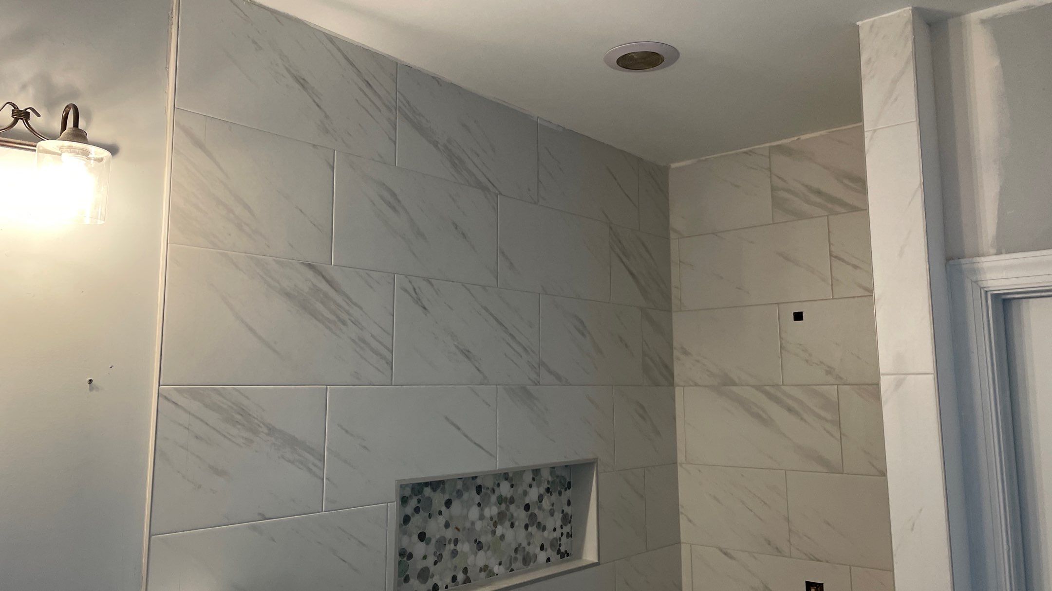 Bright Bathroom Remodel with Wall Removal, Stand Alone Tub and New Vanity by Footprints Floors of Coastal Carolina