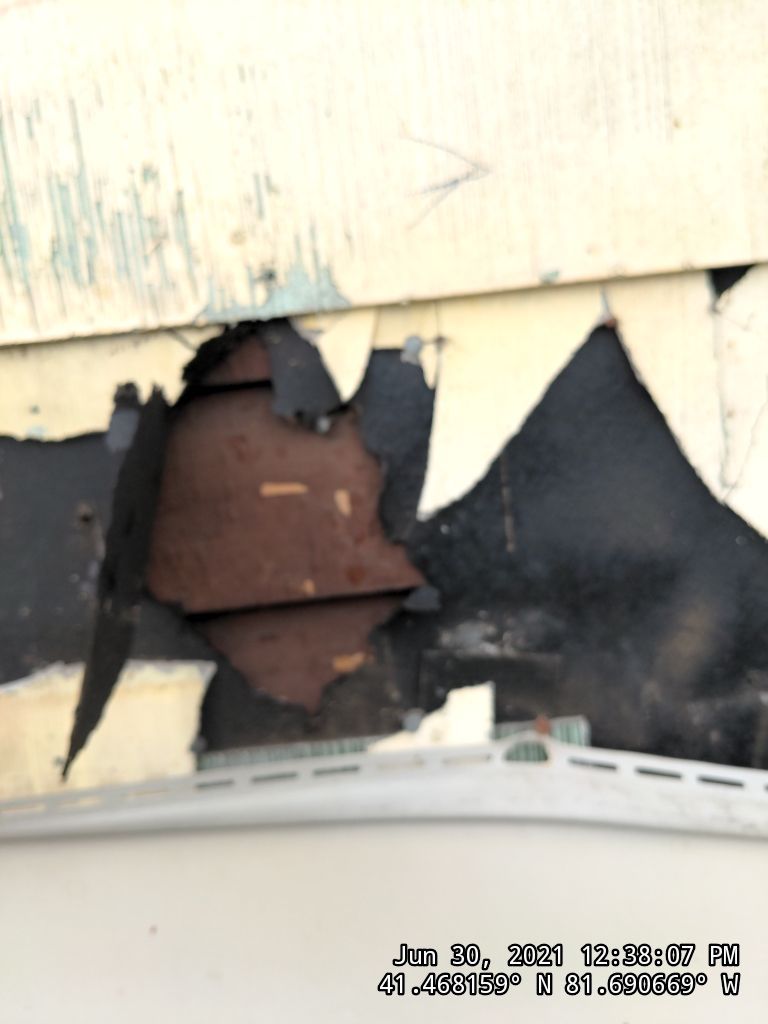 Fire damaged home in Tremont by Absolute Roofing and Construction
