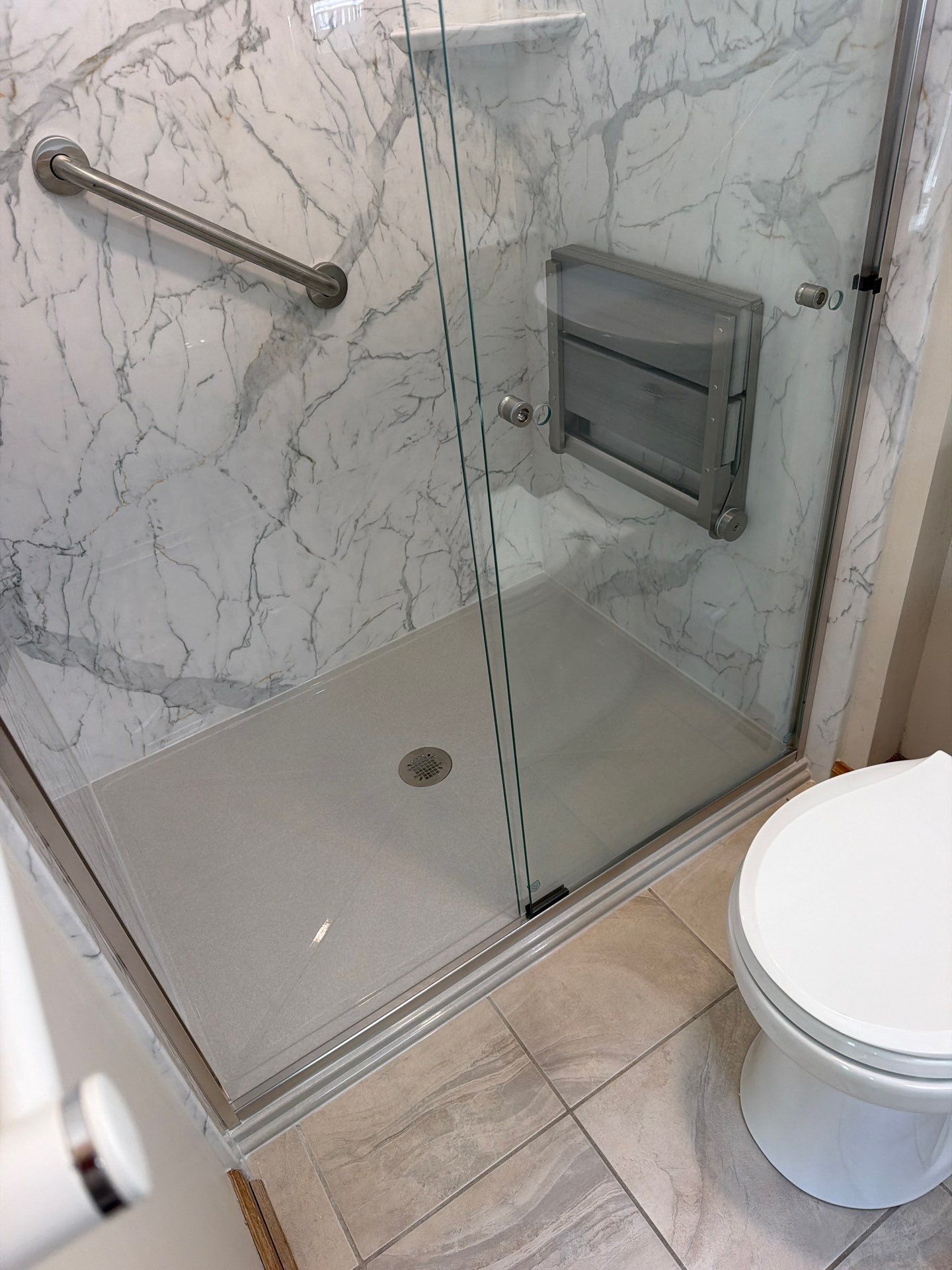 Phase II: Santorini White & Feather Onyx by Rome Bath Remodeling